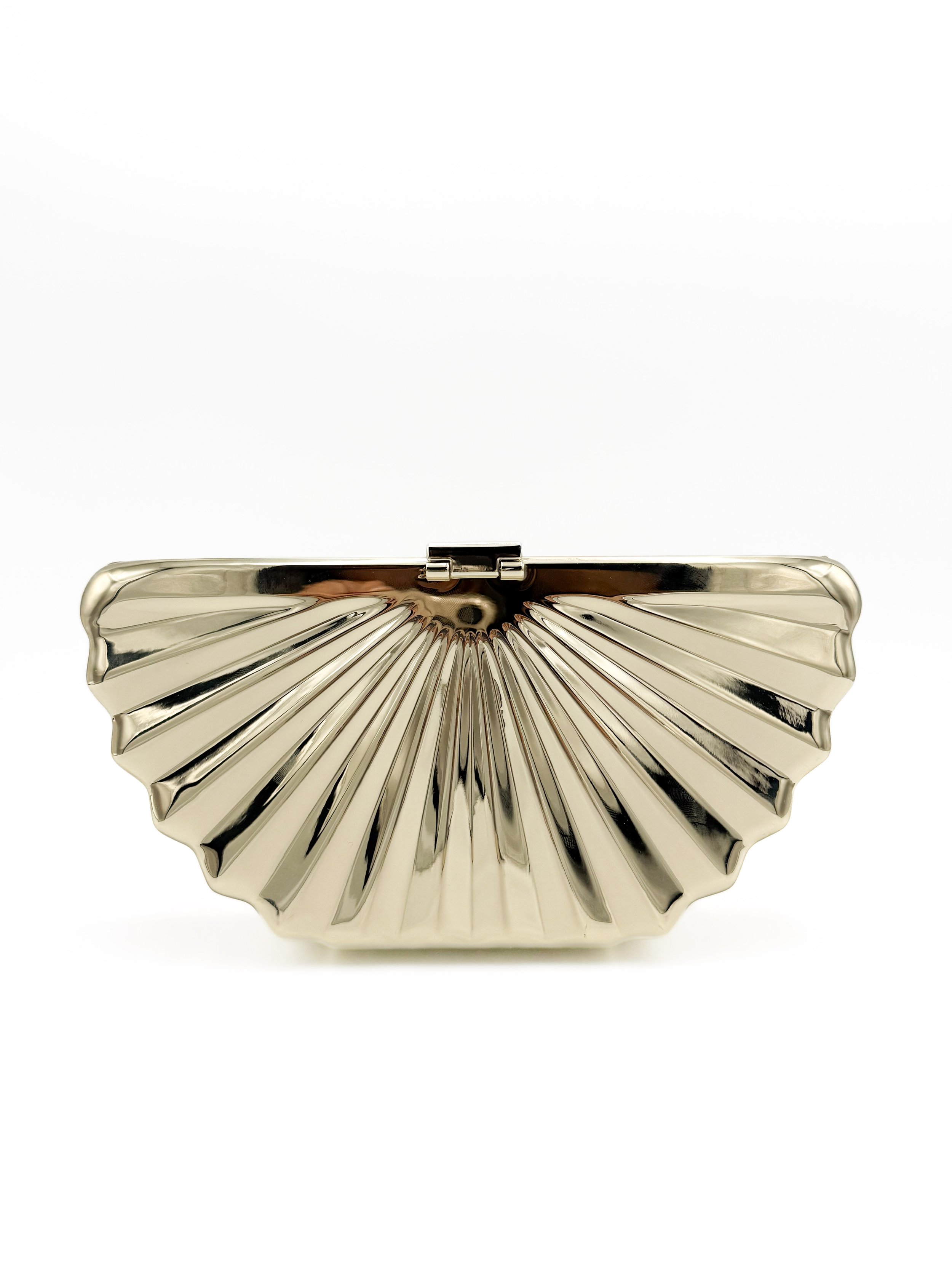 A shiny, gold-colored, fan-shaped clutch purse with ridged design.