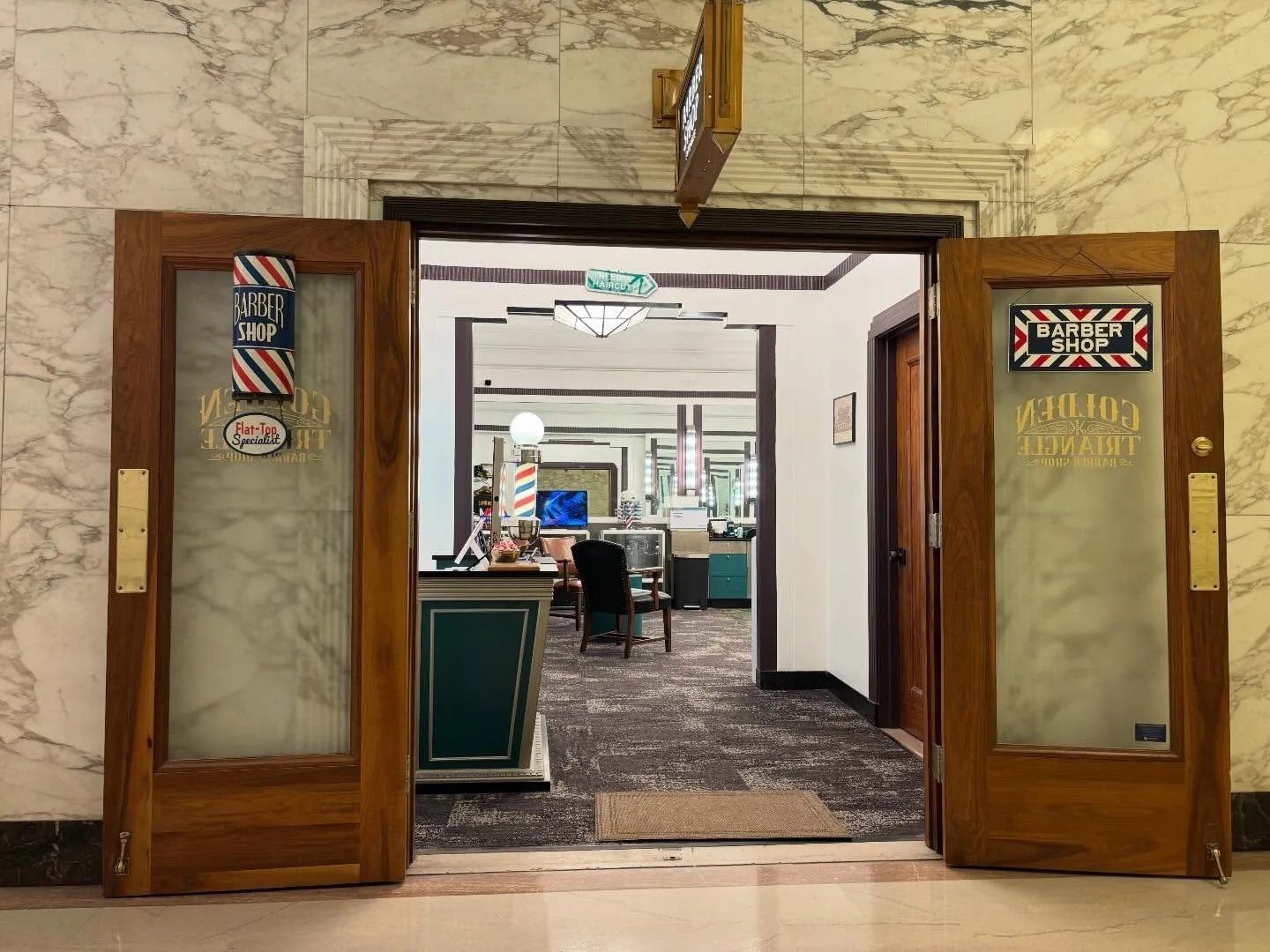 Entrance to Golden Triangle Barber Shop inside the Koppers Building in downtown Pittsburgh