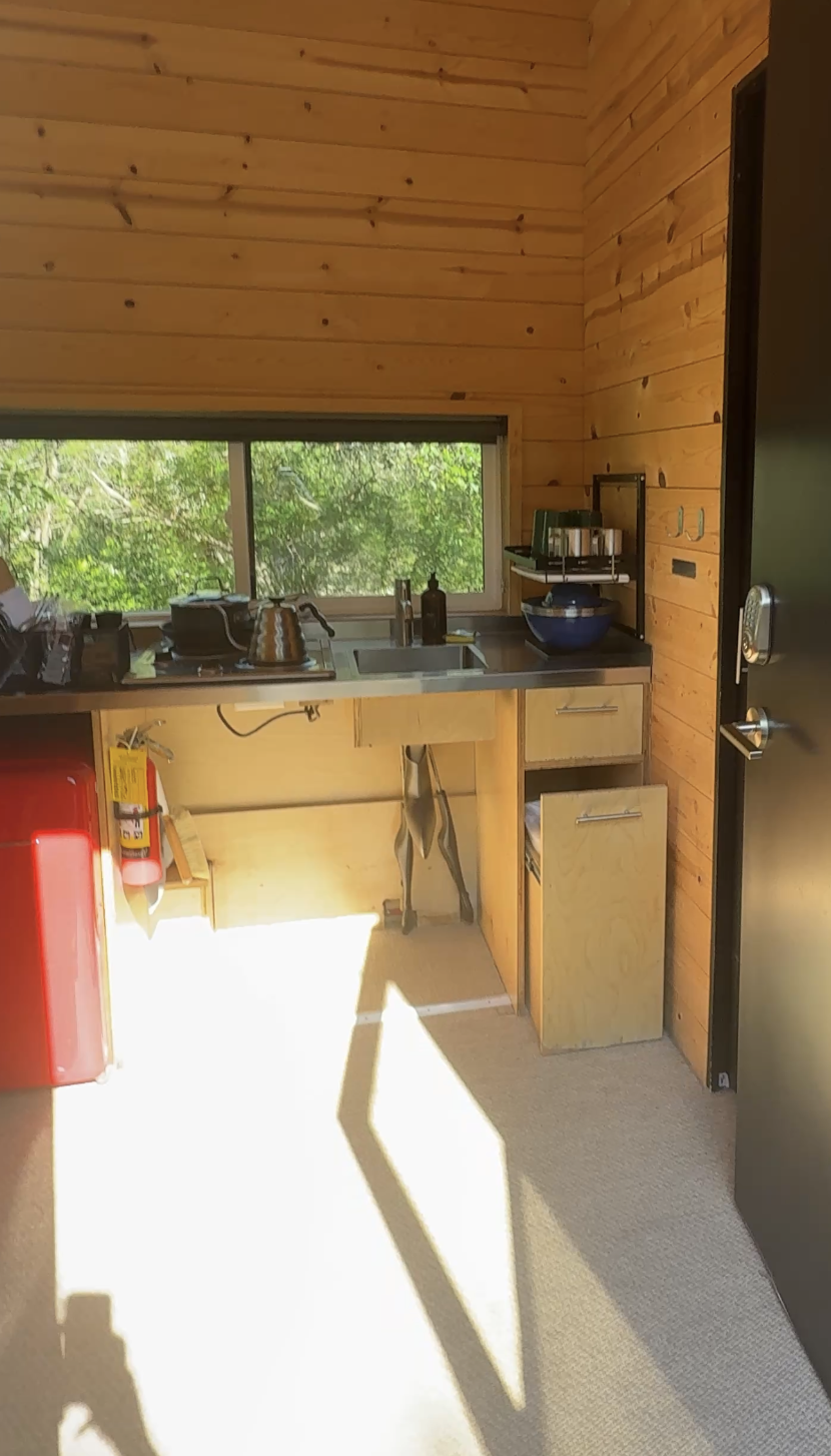Interior of the cabin. Kitchen view