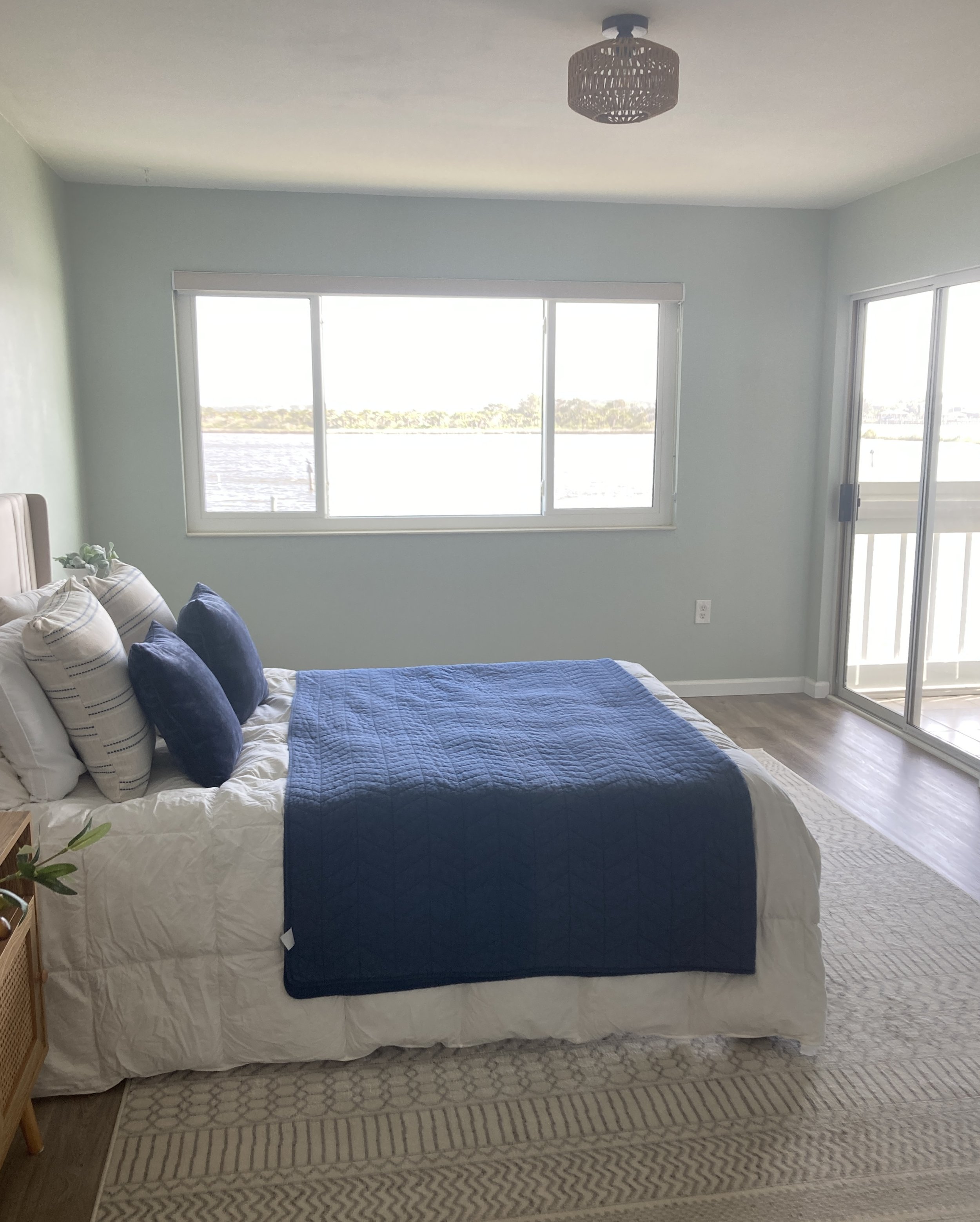 Master bedroom with beautiful waterfront views of Intercostal and opens to the patio