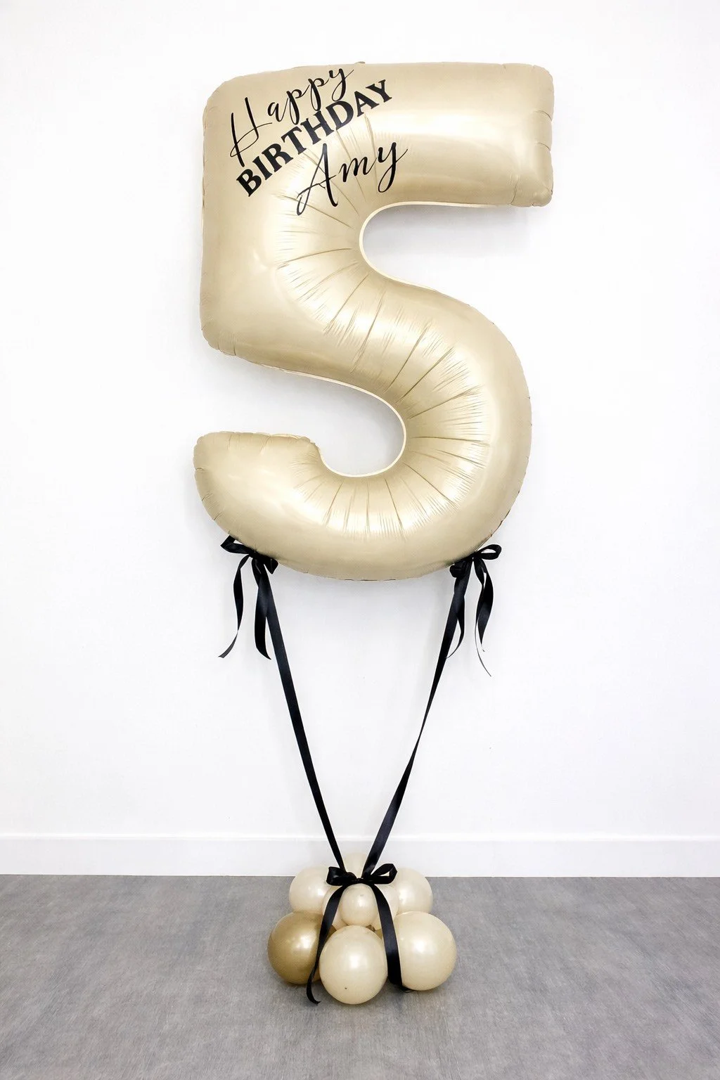 Gold number 5 balloon with