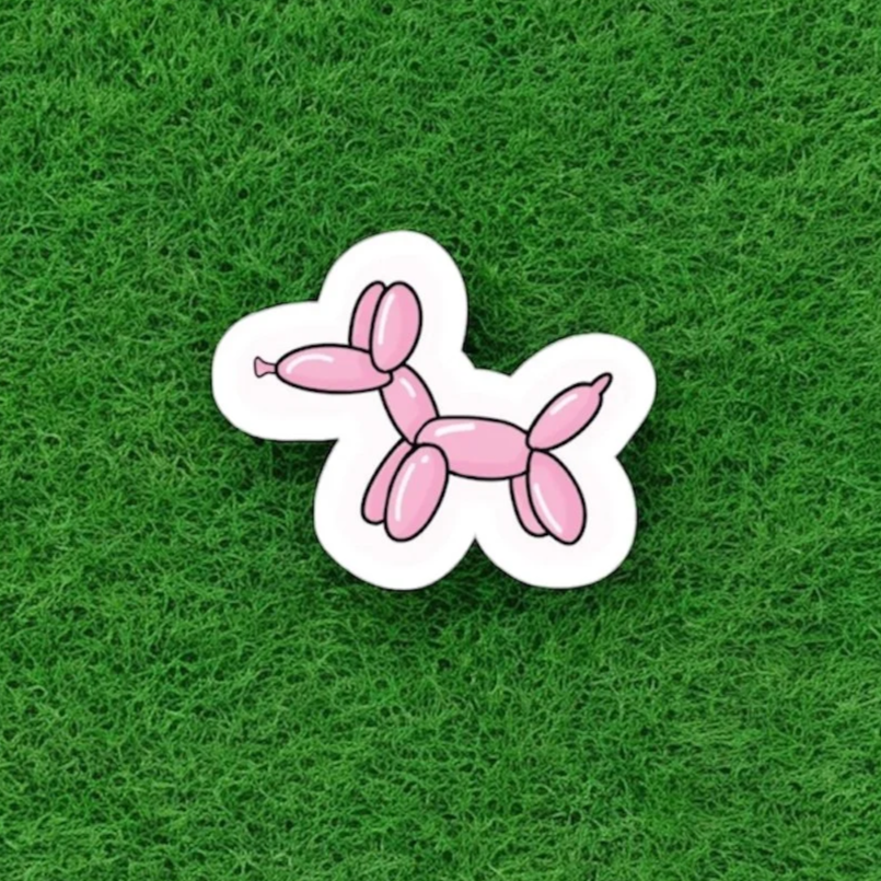 Pink balloon animal sticker on green artificial grass