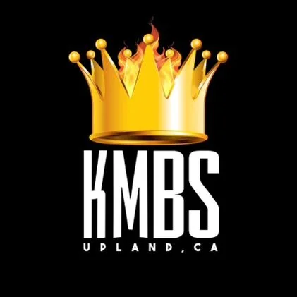 Gold crown with flames on top, above the text 'KMB'S UPLAND.CA' on a black background.