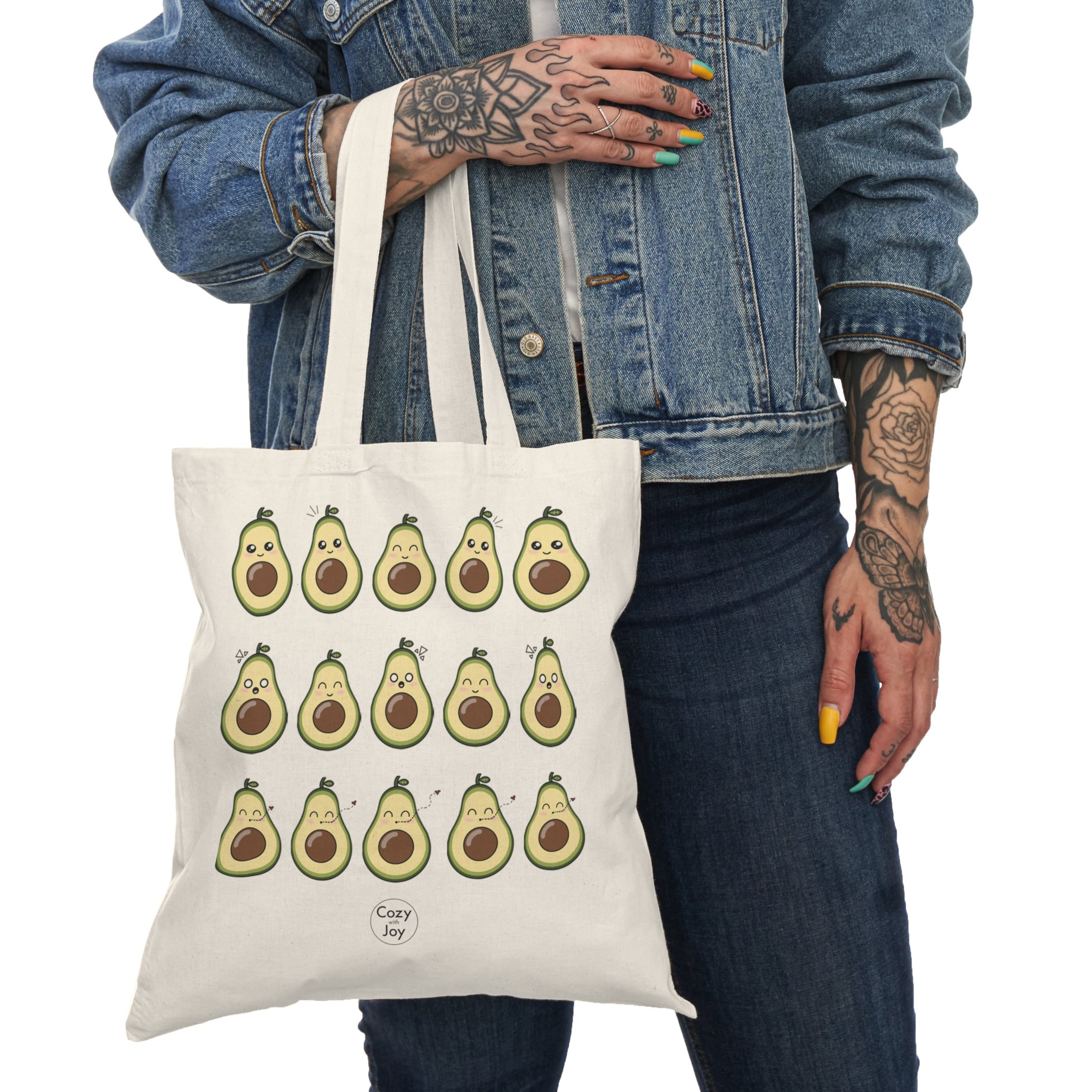Natural canvas tote bag featuring a playful kawaii avocado design on the front. Perfect for groceries, books, or everyday essentials