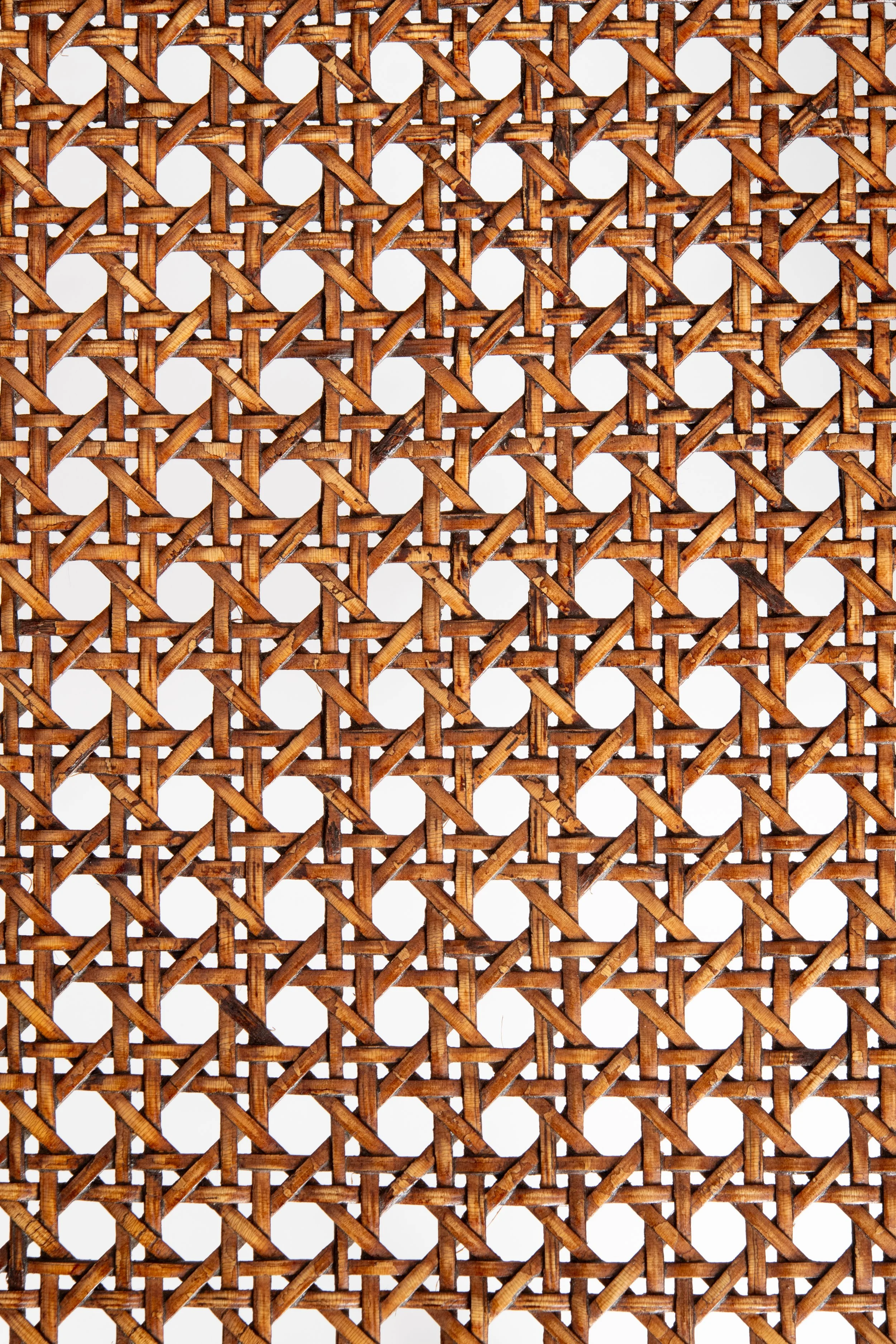 Close-up of the chair’s original handwoven caning