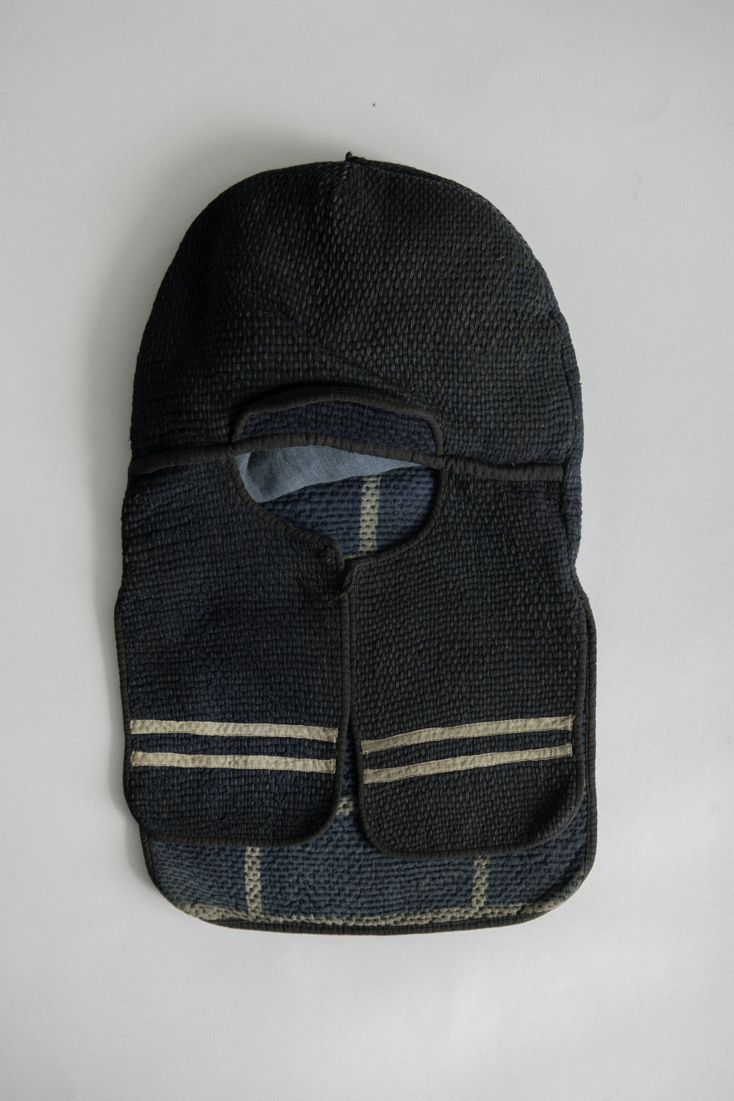 Meiji period Japanese indigo-dyed sashiko hikeshi zukin (fireman's hood), front view.