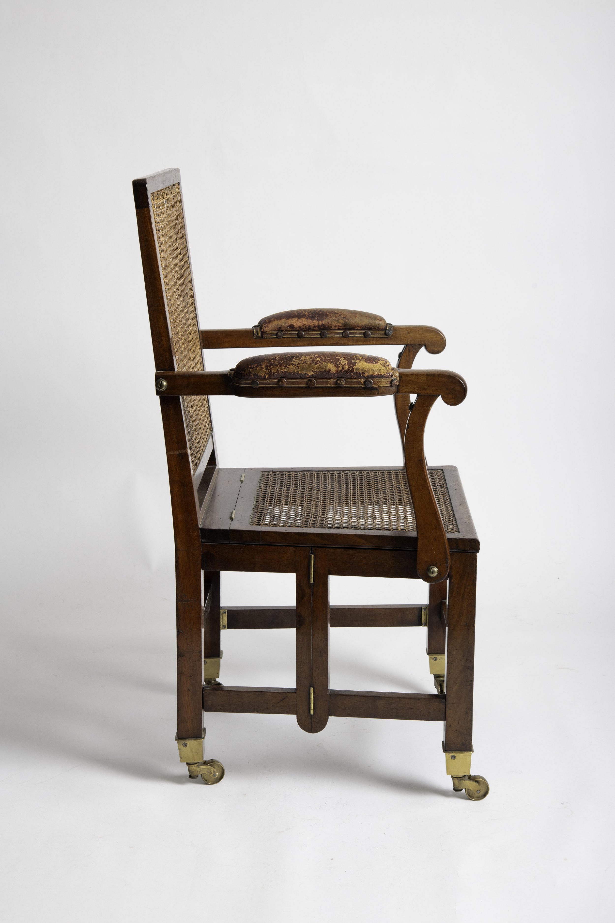 Side profile of the Johnstone & Jeanes metamorphic campaign armchair