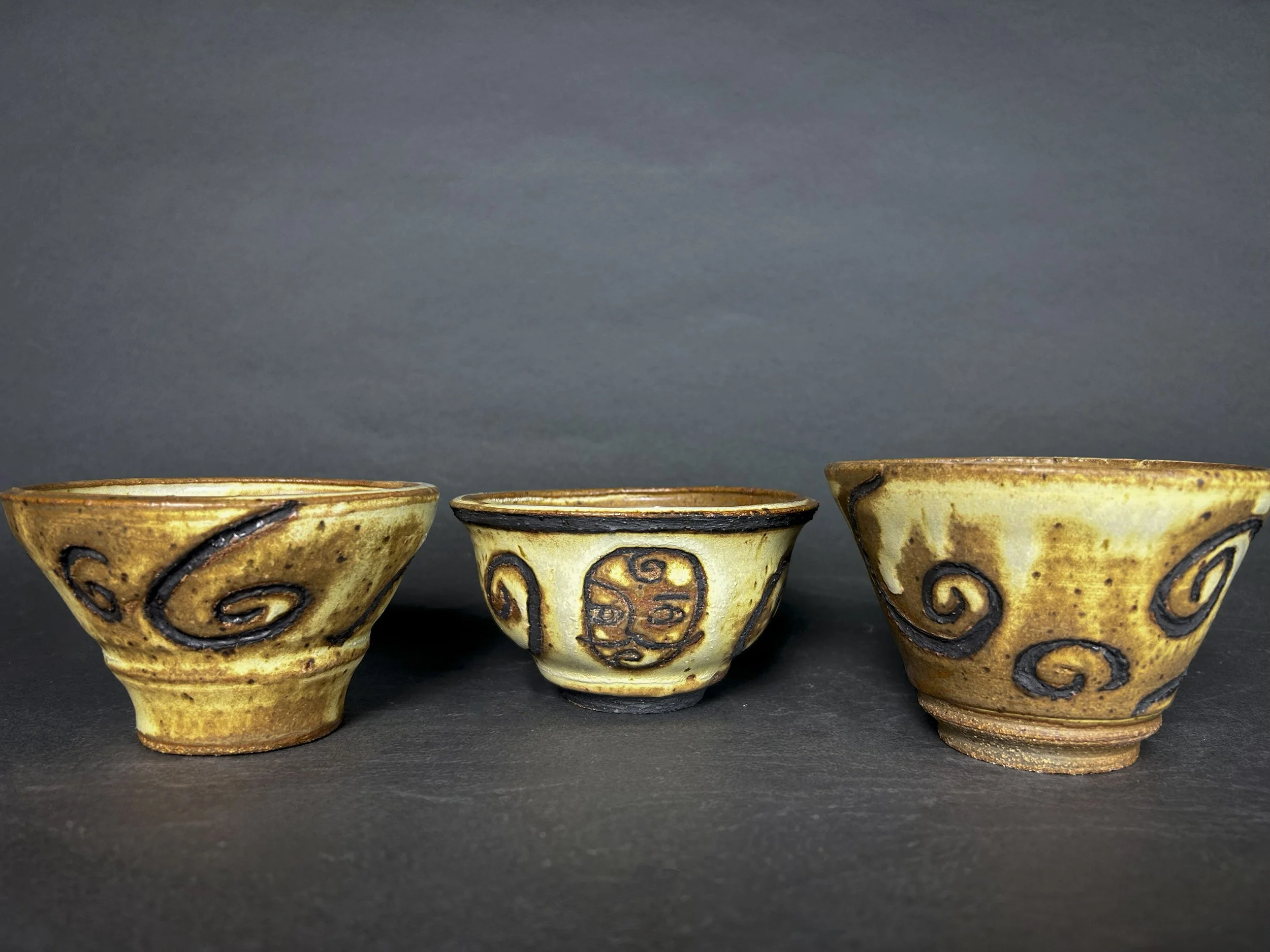 teacup set - Yellow salt high fire glaze, black slip