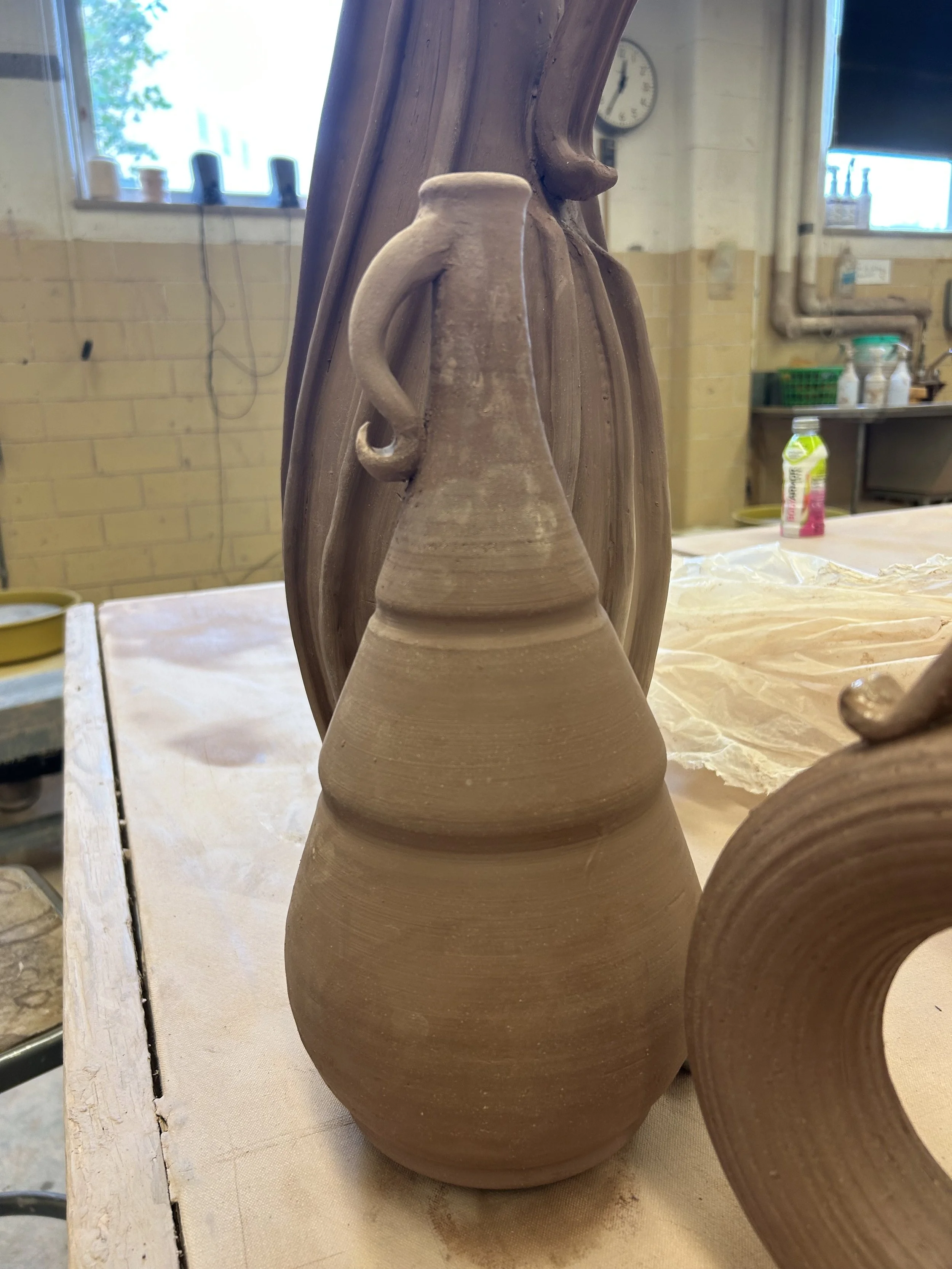 unfinished thrown/hand built