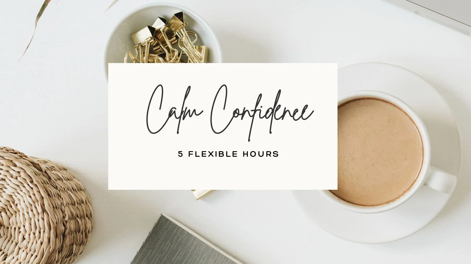 A flat lay of a white coffee cup filled with coffee on a saucer, a small bowl with gold binder clips, a woven basket, and a closed book on a white surface with a white background.