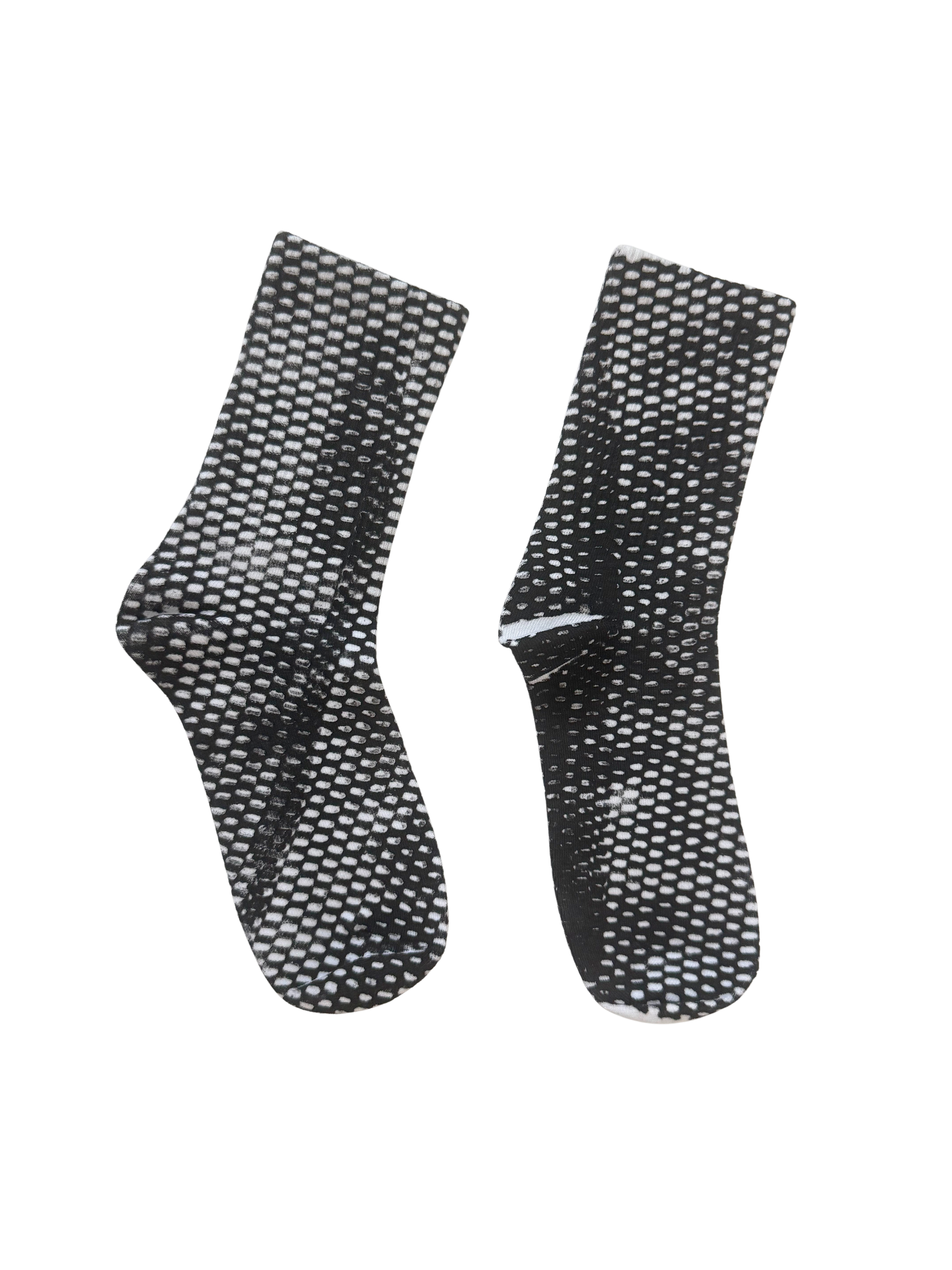 Enmeshed on White R.png