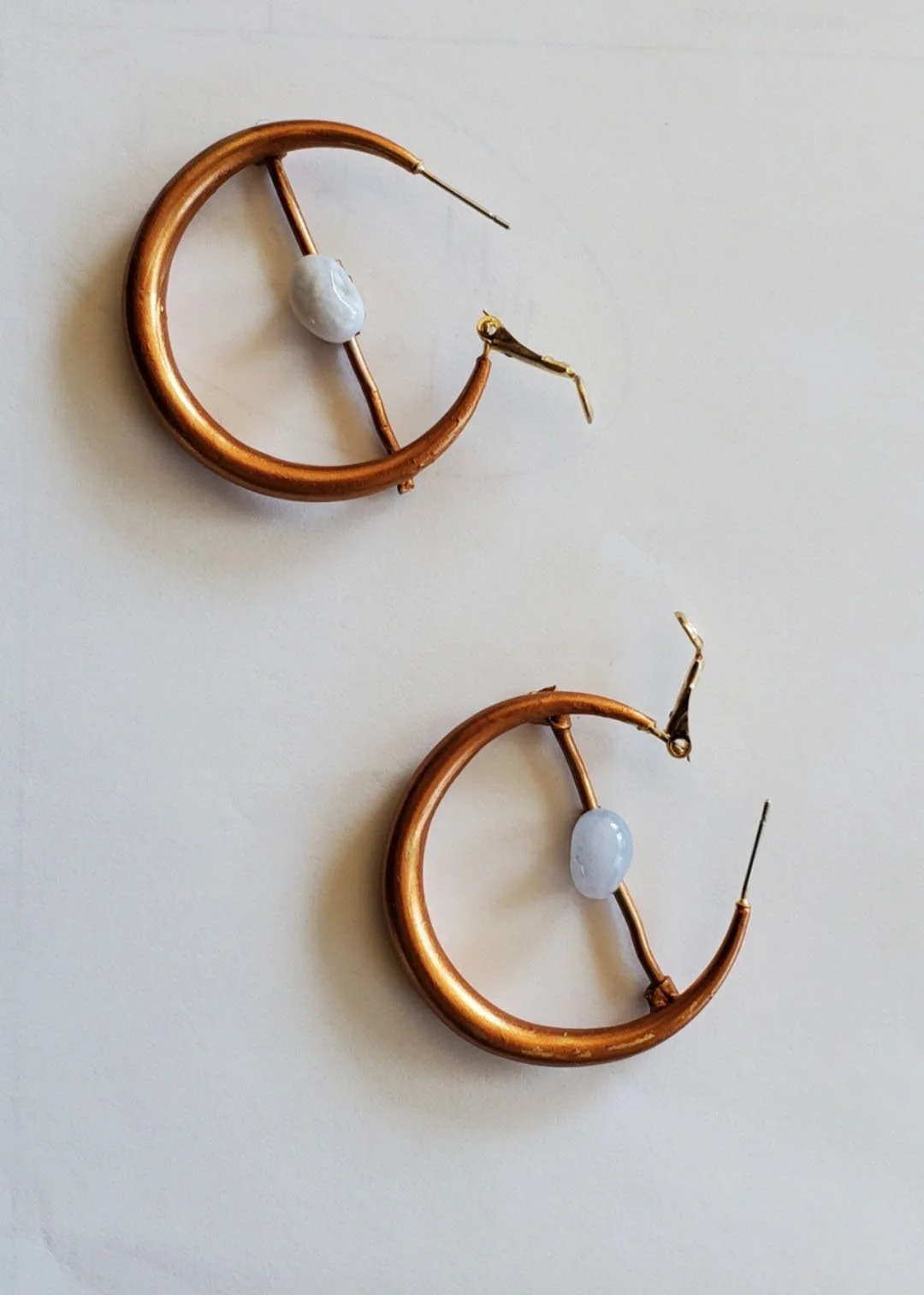 SOS earrings.jpg