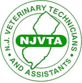 Logo of the New Jersey Veterinary Technicians and Assistants featuring a green outline of New Jersey with a green banner reading 'NJVTA' inside and surrounded by green text stating 'N.J. Veterinary Technicians and Assistants'.