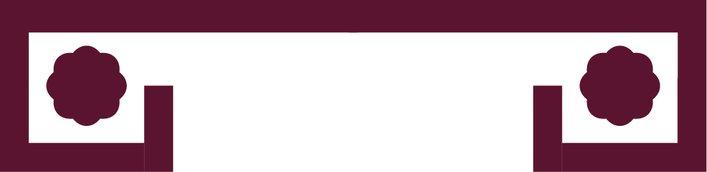 White rectangular object with purple decorative circular shapes on each end, set against a dark maroon background.