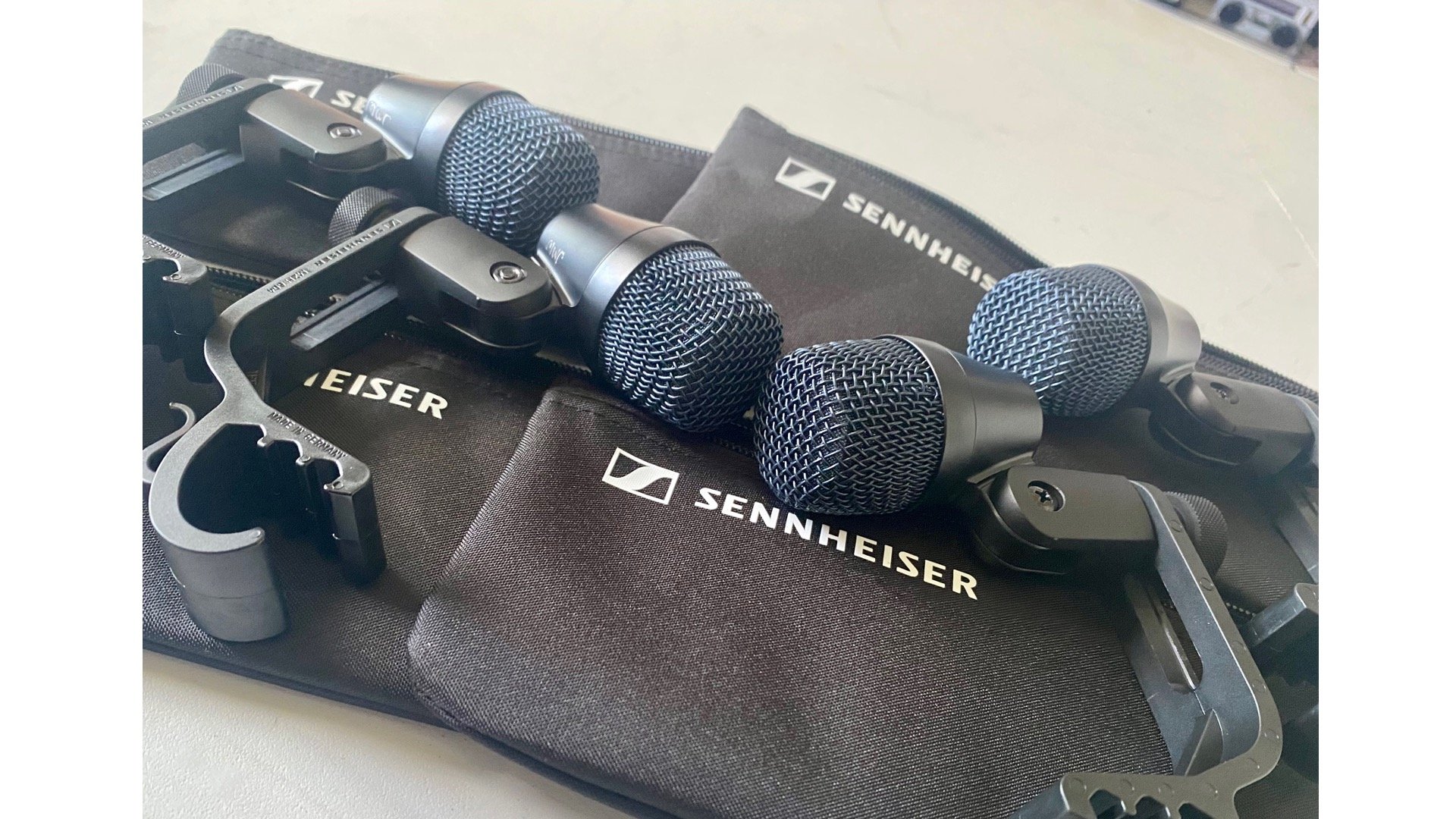 Sennheiser microphones with clamps and carrying pouches