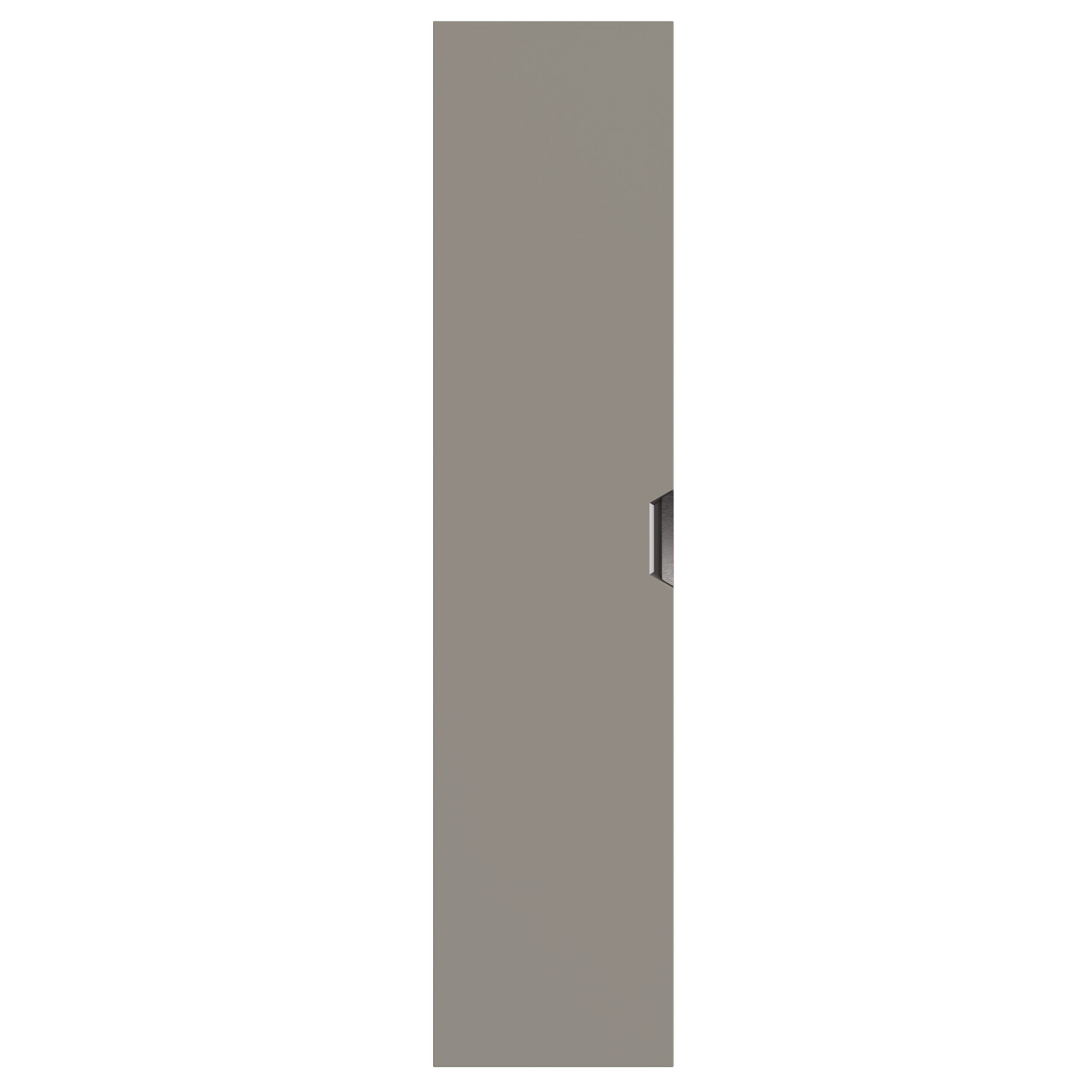 Close-up of a gray wall with a small black rectangular object protruding from the middle