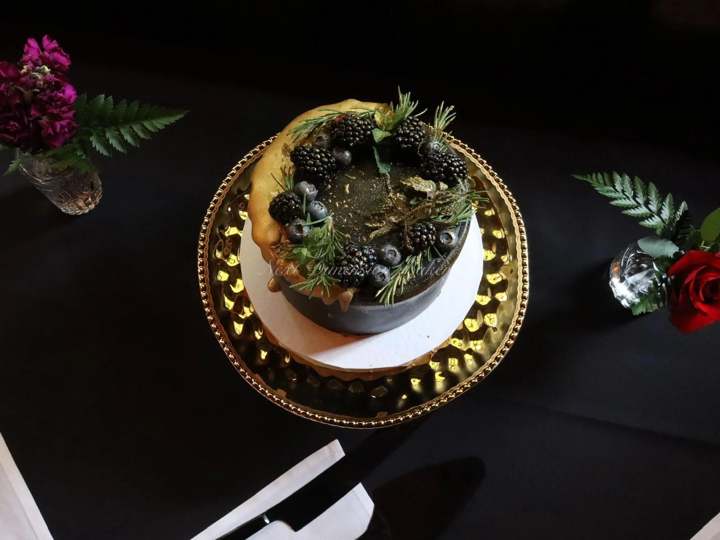 2024.10.31_Vasquez_Wedding_Black_Gold_Drip_Cake.jpeg