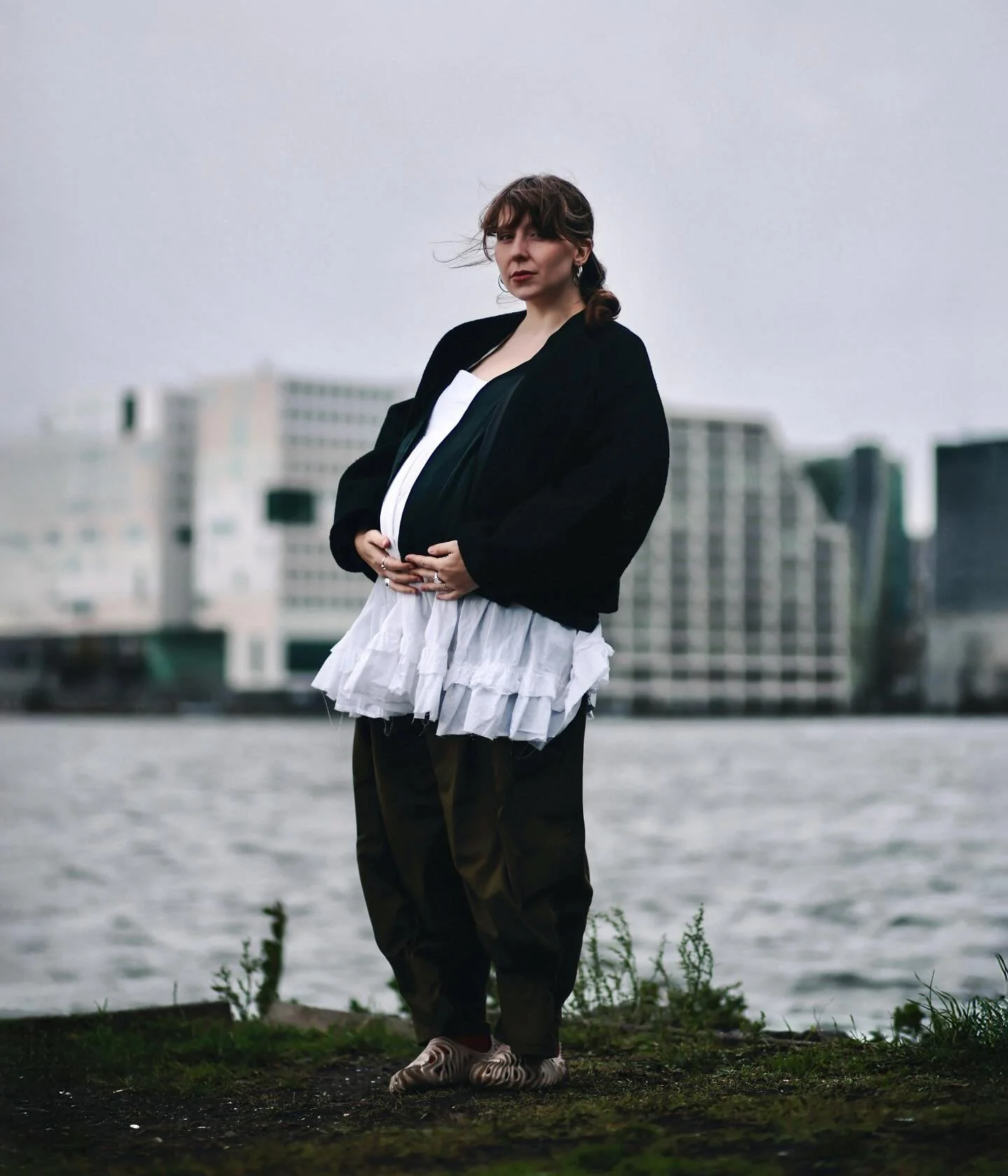 october 2025, autumn. it might be grey but my beautiful friend @databosma was glowing while standing next to het ij after we watched a melodramatic exhibition together when i decided to make this portrait of her.