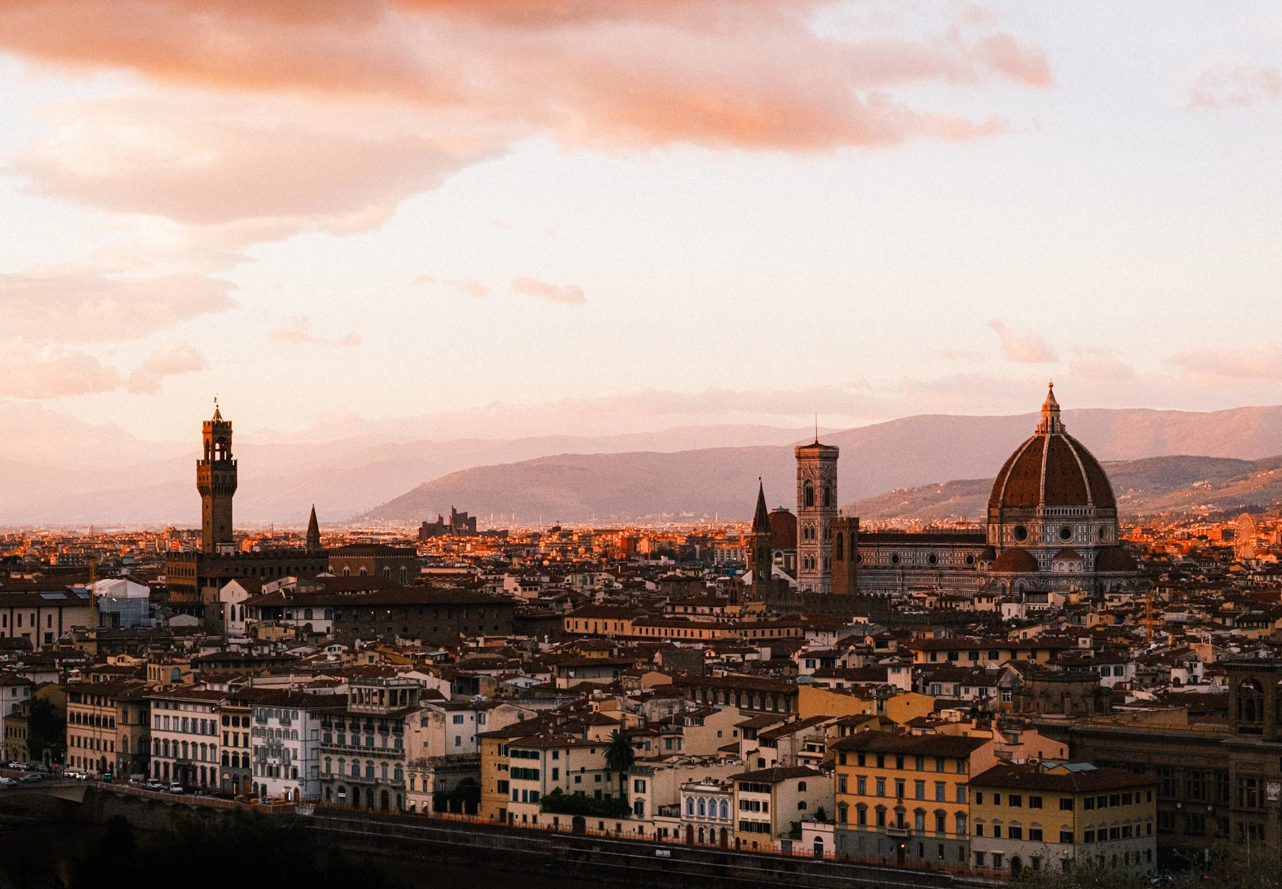 Florence skyline at dusk with the Duomo and Palazzo Vecchio