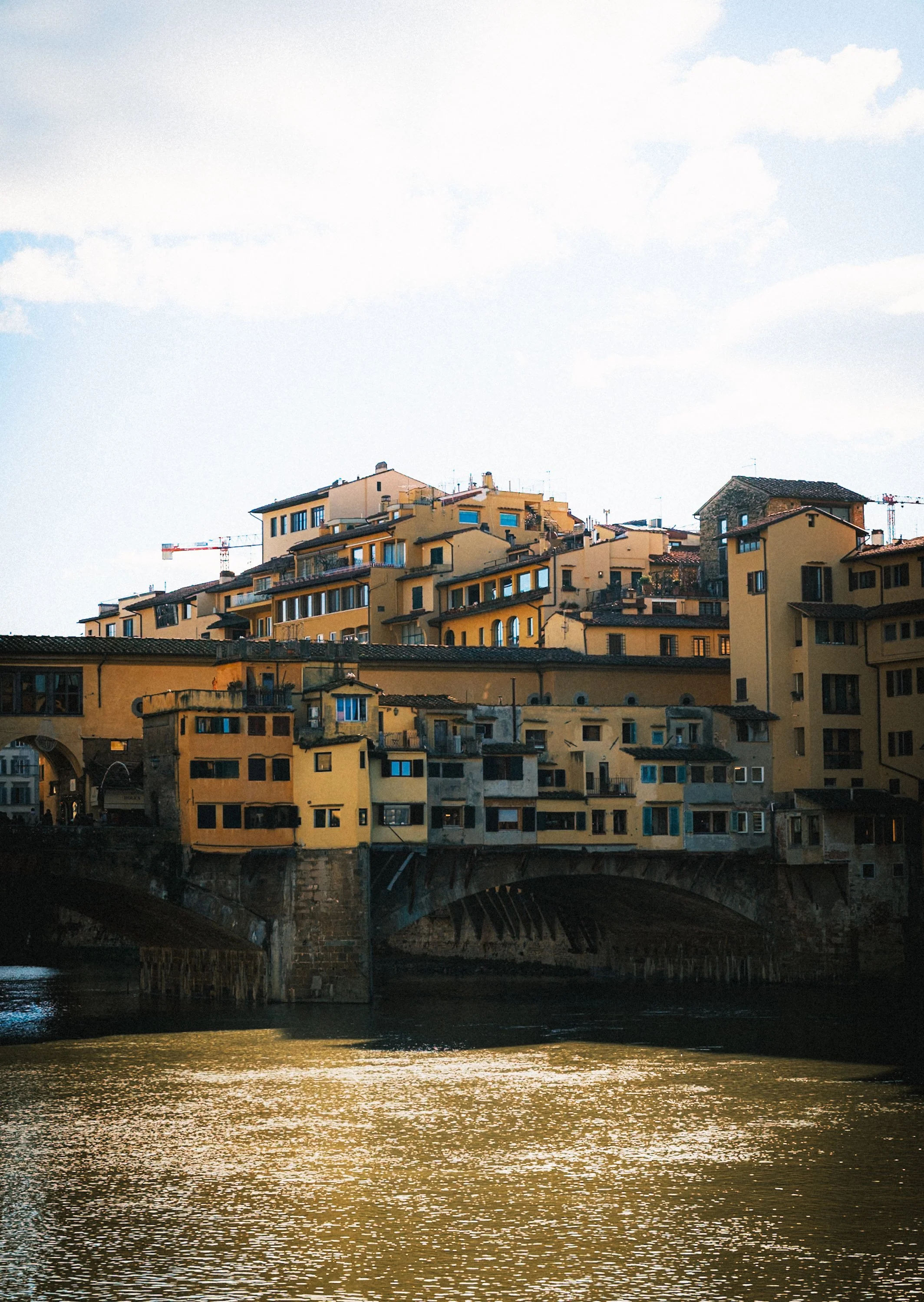 Historic buildings of Ponte Vecchio above the Arno River in Florence