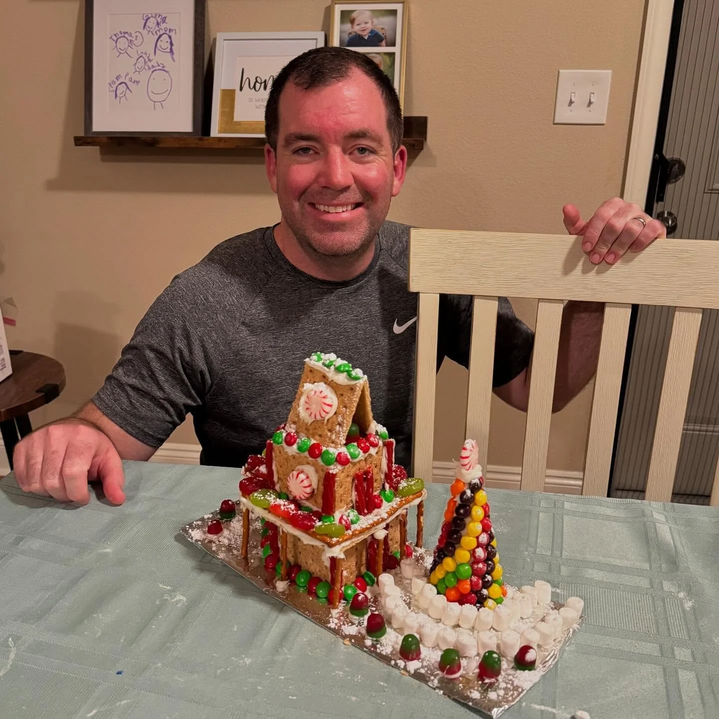 Our gingerbread house tradition:
- My husband builds like he&rsquo;s on a home design show. 🏠✨
- The kids sneak candy faster than they can decorate. 🍬
- And me? I&rsquo;m here soaking up the sweet chaos and sticky smiles. ❤️

It&rsquo;s these littl