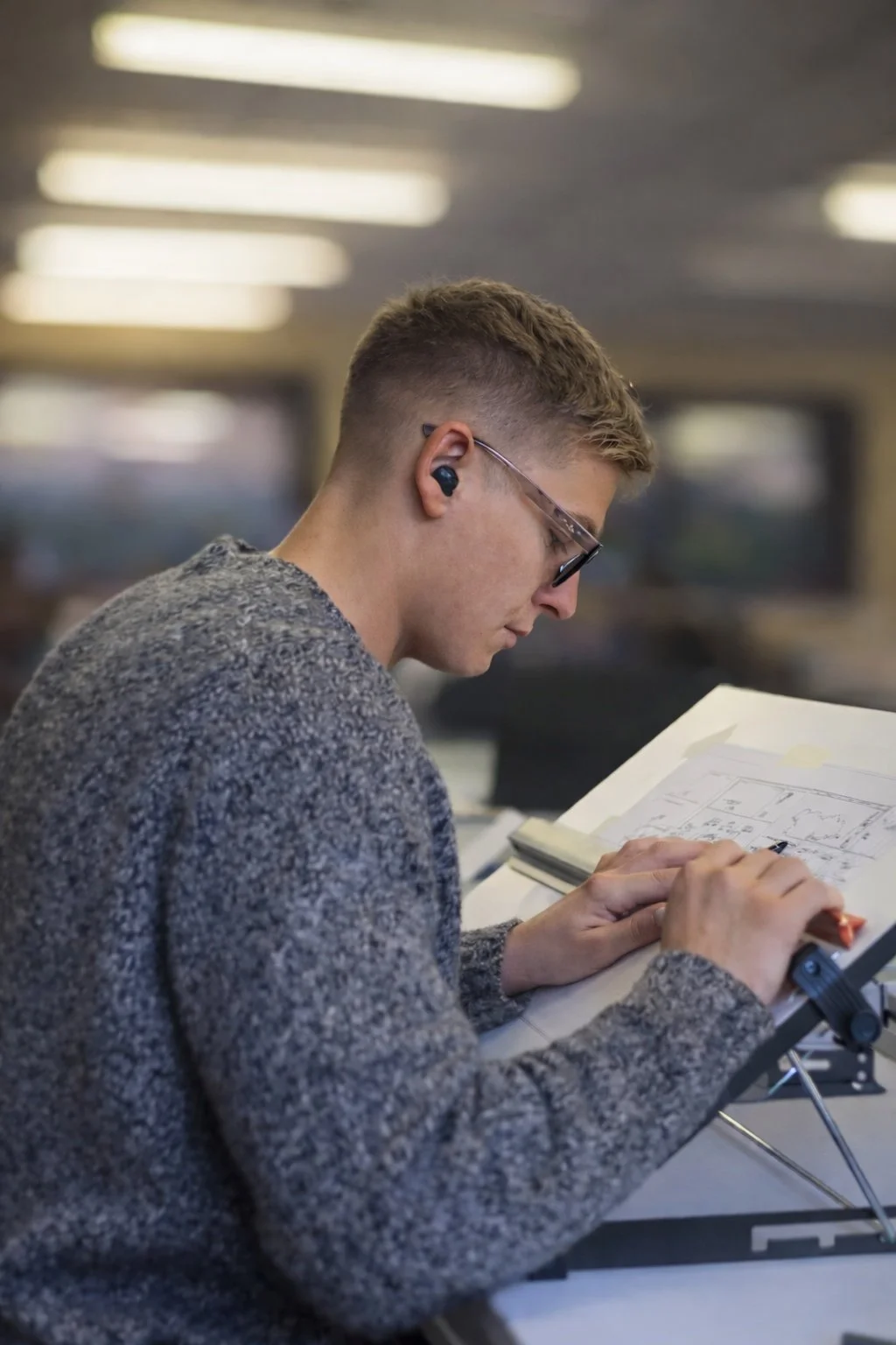 Garden designer Luciano Zeraschi creating a bespoke garden design plan for a North London landscaping project.