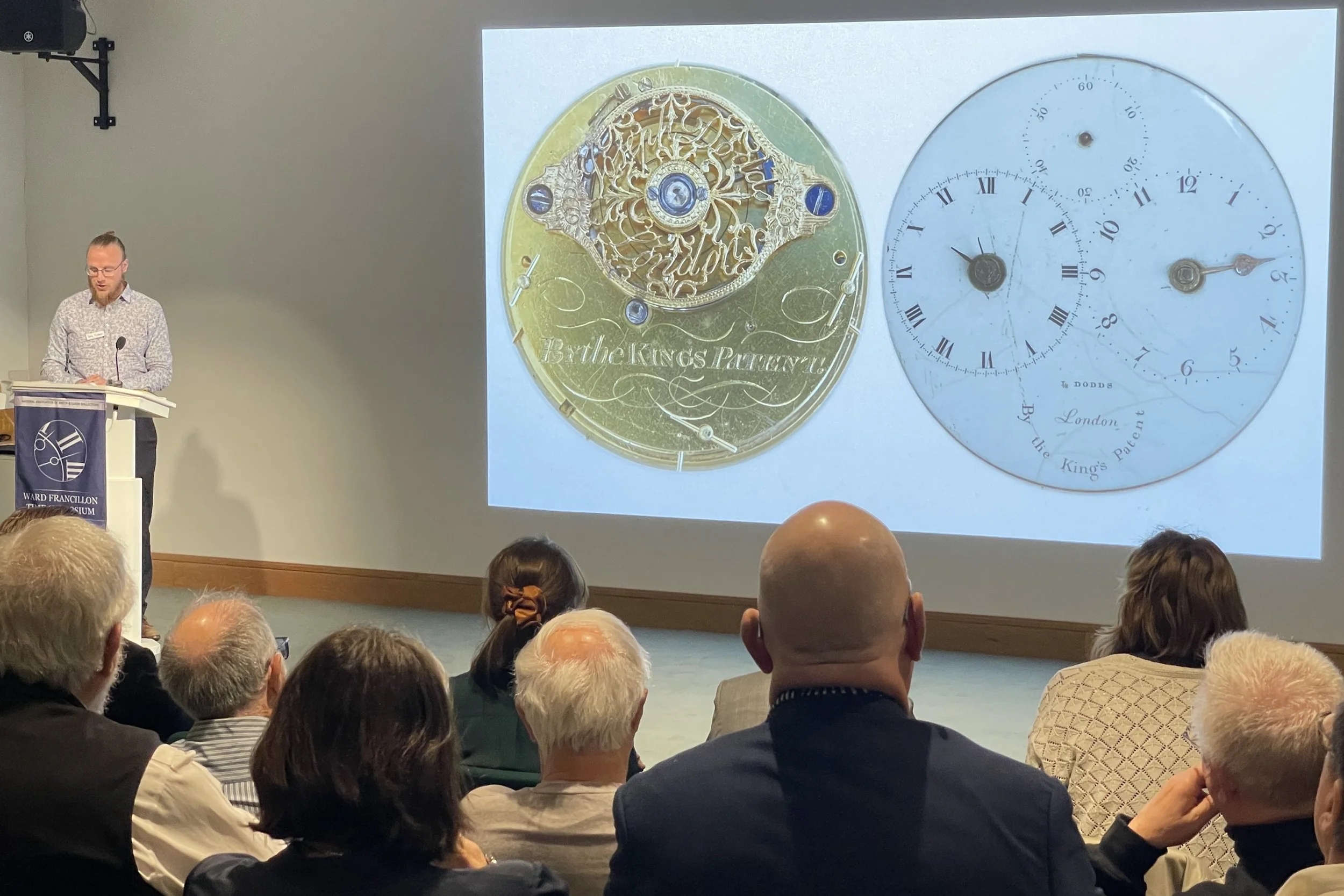 Dale Sardeson delivering a horological presentation in a lecture theatre