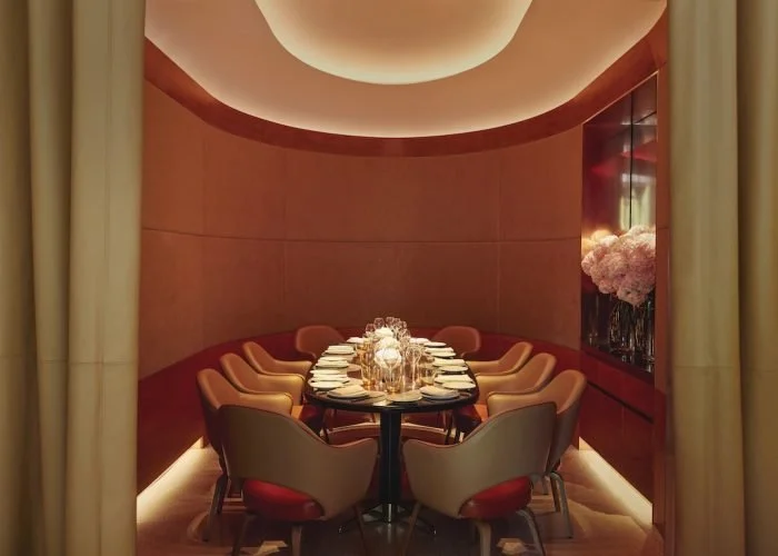 red room, dinning table and 12 seats