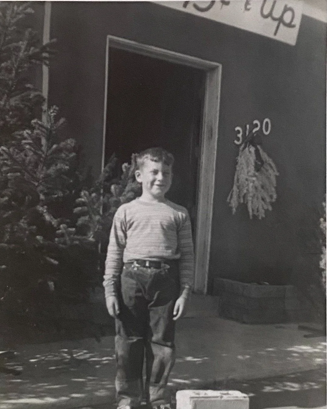 📸 Farmer Bill, circa 1962.

If you can believe it... one of Bill's first sales were &quot;Charlie Brown&quot; Christmas trees. 

Pictured, here, in front of what is now the @natesgardengrill doorway: trees $0.75 and up.

🎄 Our trees return this wee