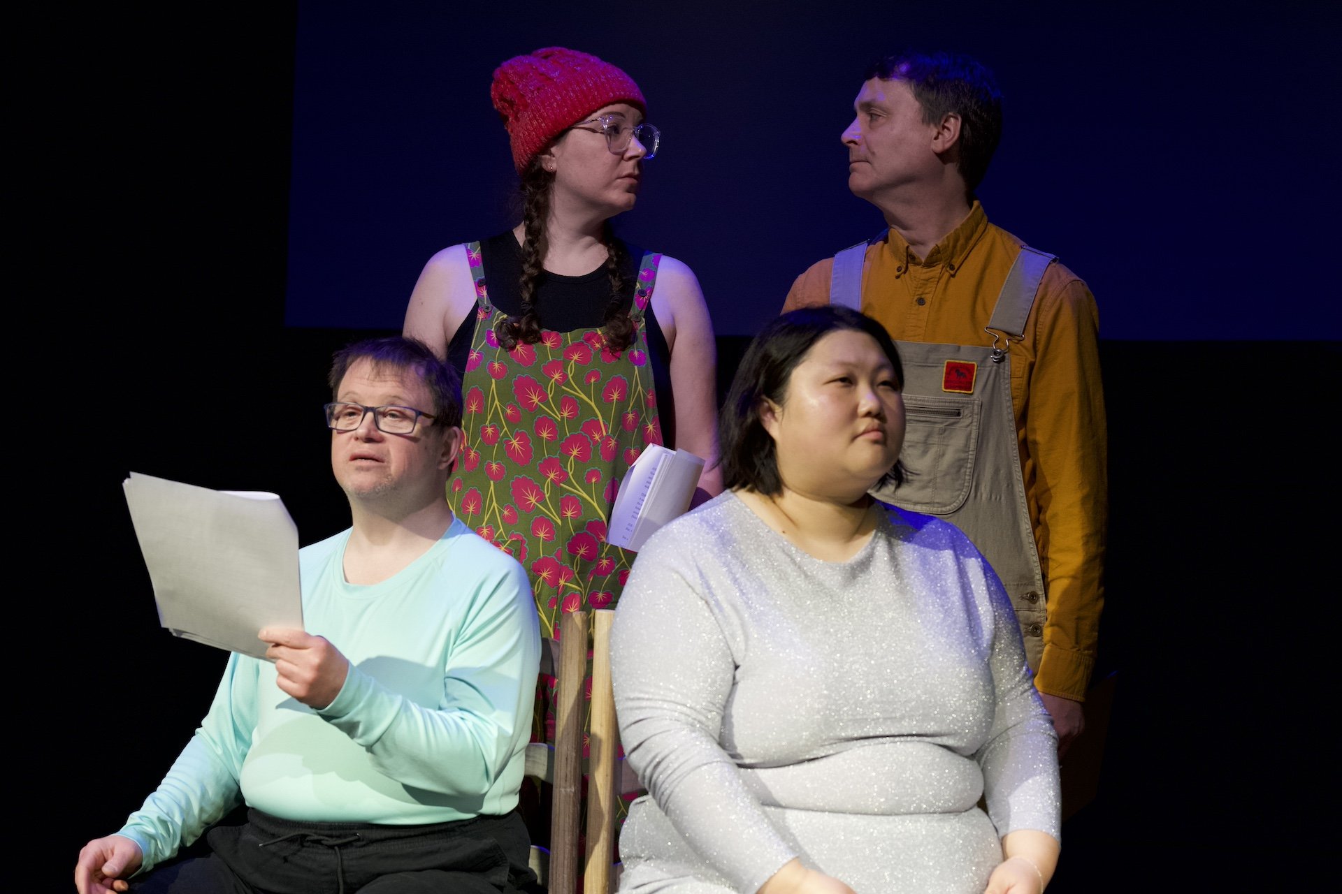 Photo by Tyler Preece. Clockwise from left: Zoe Tomaras, Timothy Anderson, Angela Sun and Andreas Prinz. Zoe and Timothy face each other, with Andreas and Angela sat on chairs in front of them.