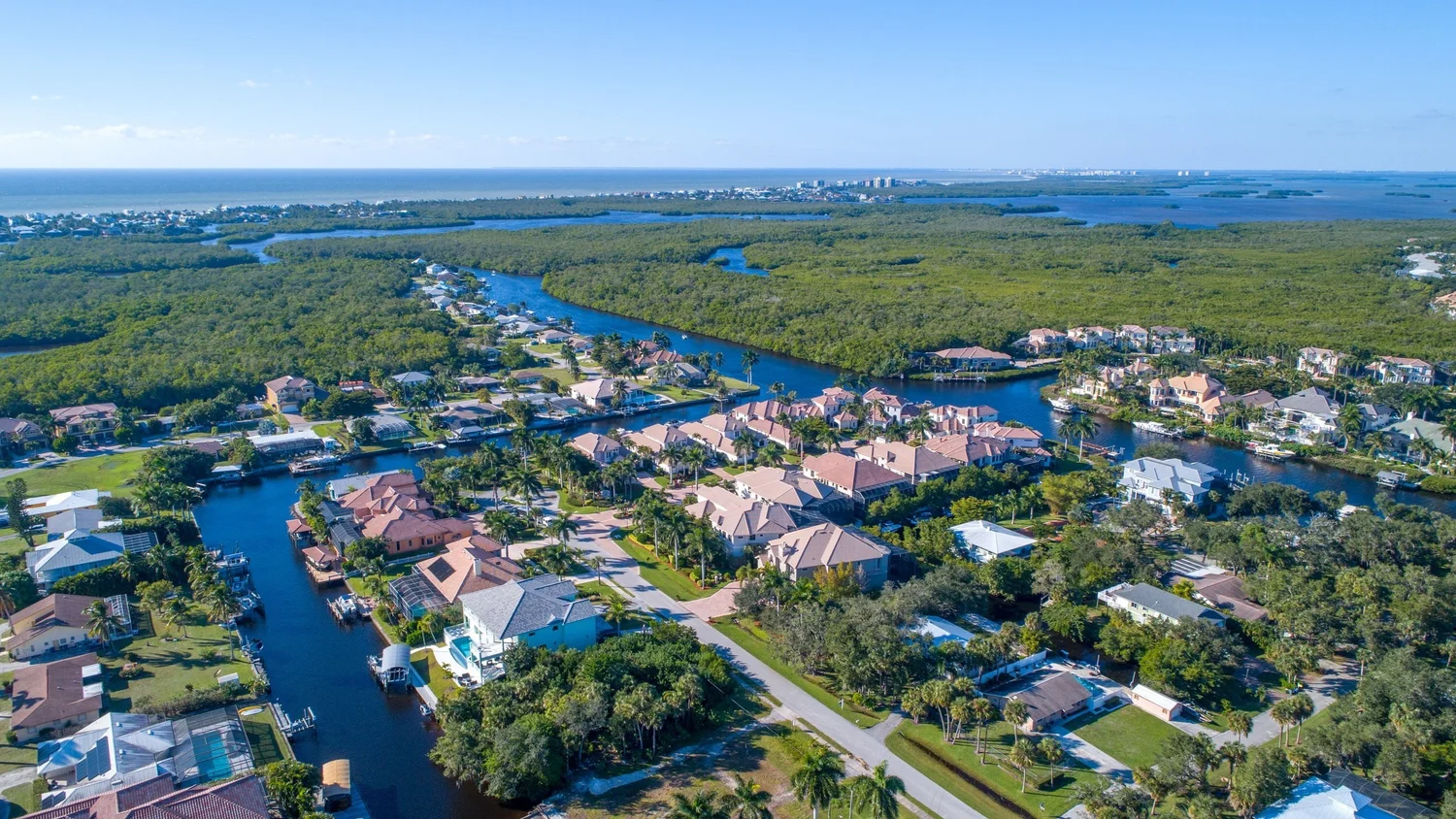 Waterfront canal homes in Cape Coral showcasing real estate market opportunities