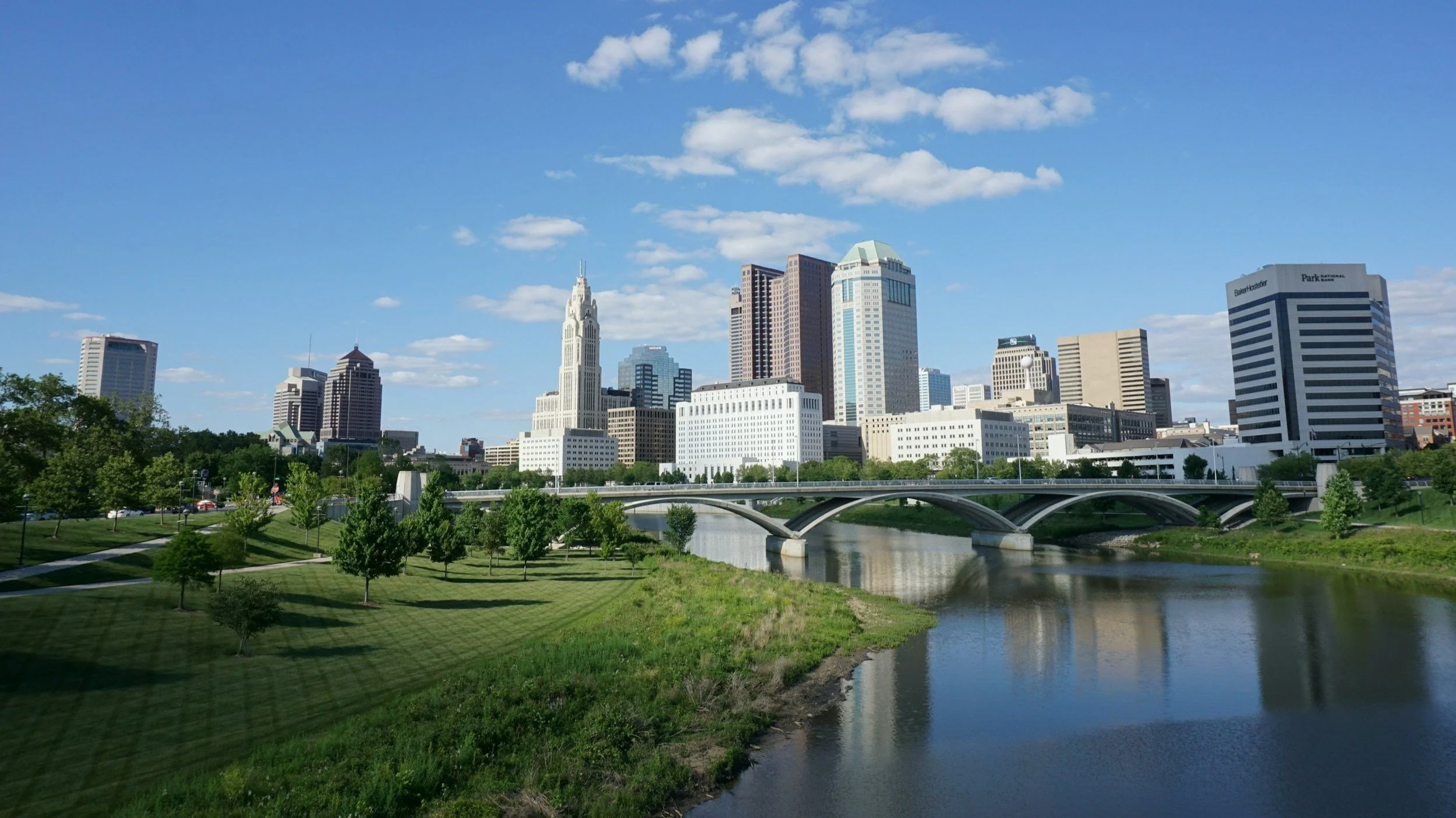 Skyline at dusk along the Scioto Mile in Columbus showcasing real estate market opportunities