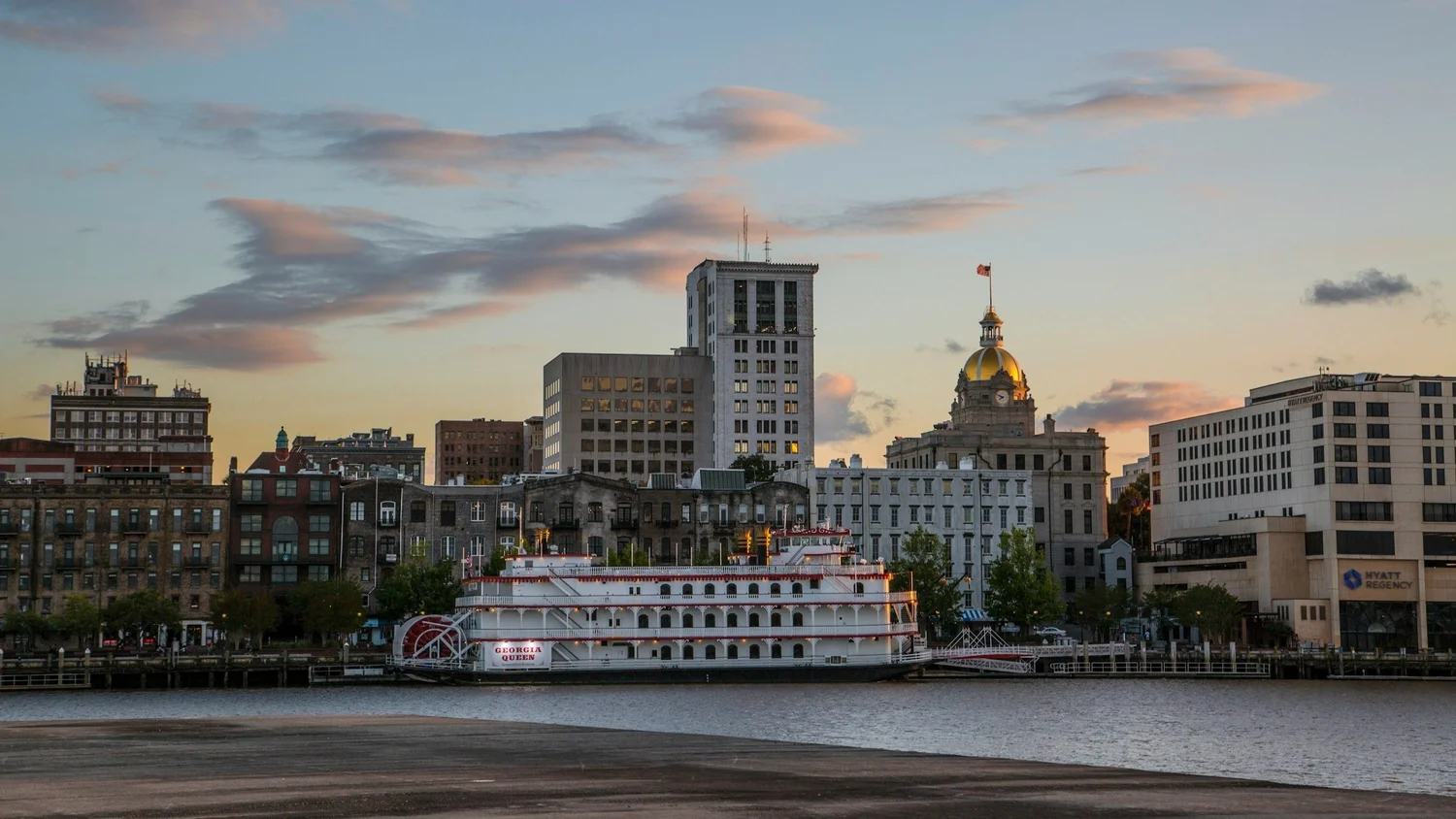 Historic riverfront skyline in Savannah showcasing real estate market opportunities