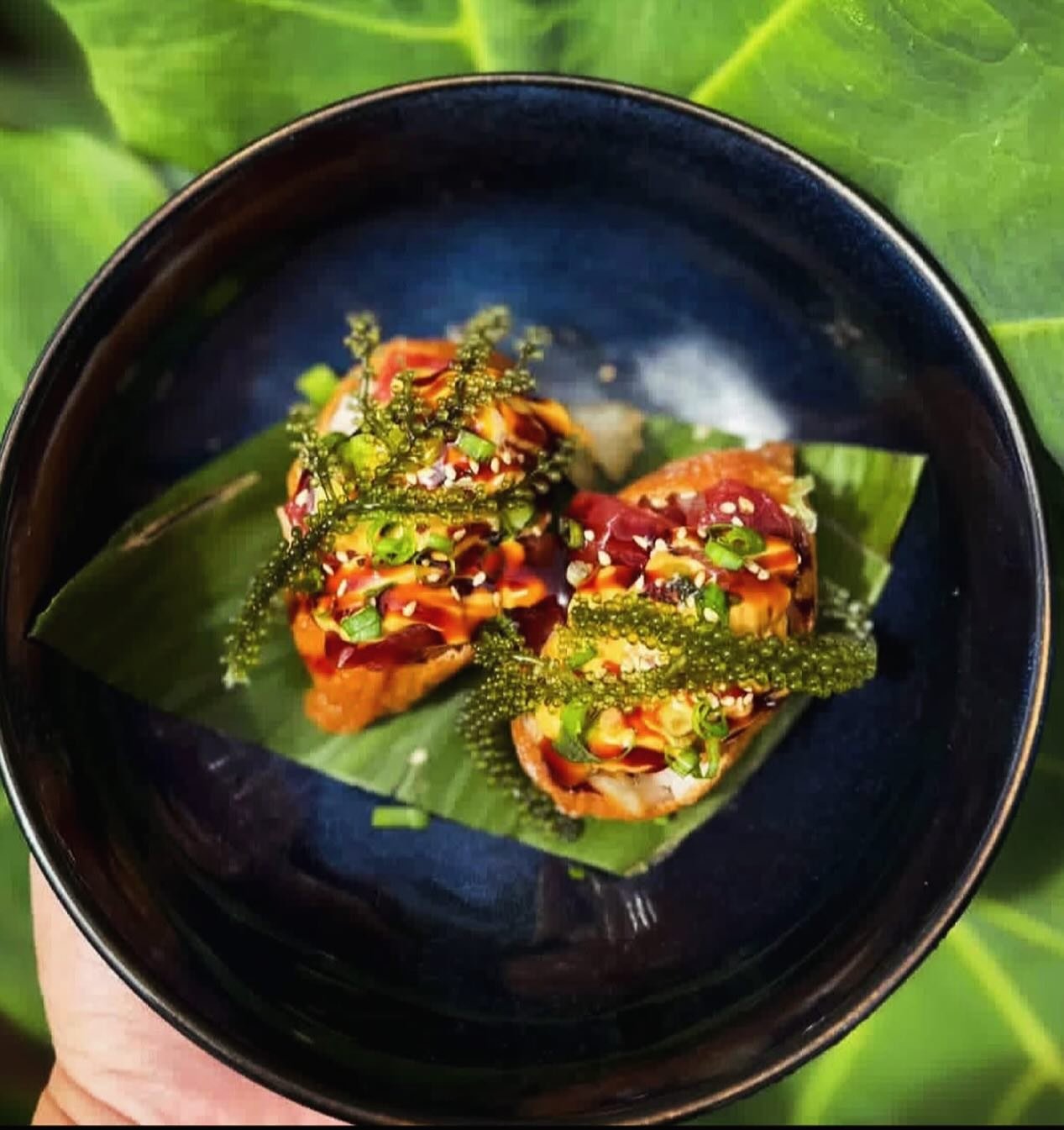 another beautiful plate (Spicy Tuna Inari with our Kona #greencaviar) from Chef Henry and the team at @seascapemaui. We love to see what chefs and home cooks are doing with our #limu! Keep the creations coming!