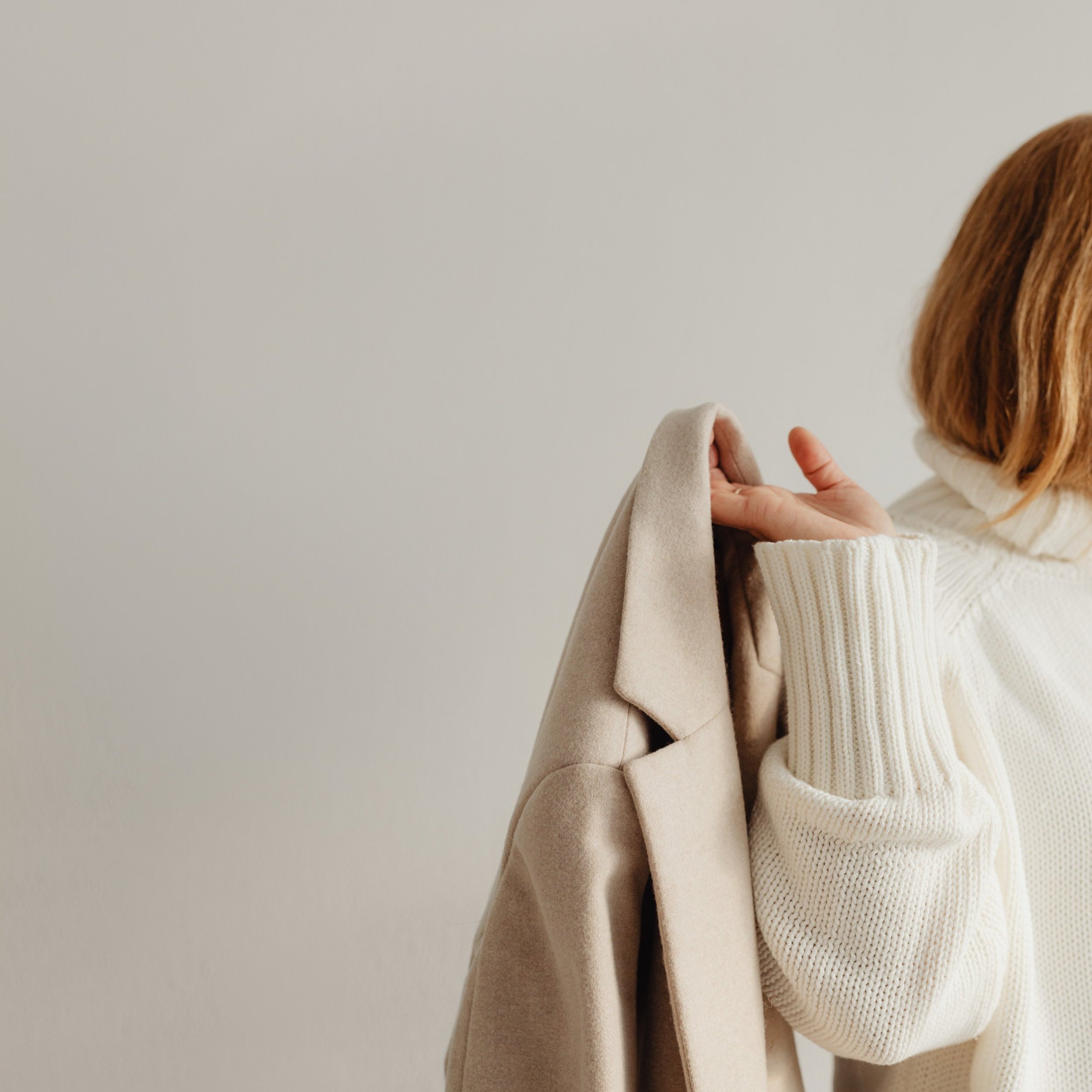 kaboompics_woman-in-white-sweater-beige-wool-jacket-29435.jpg