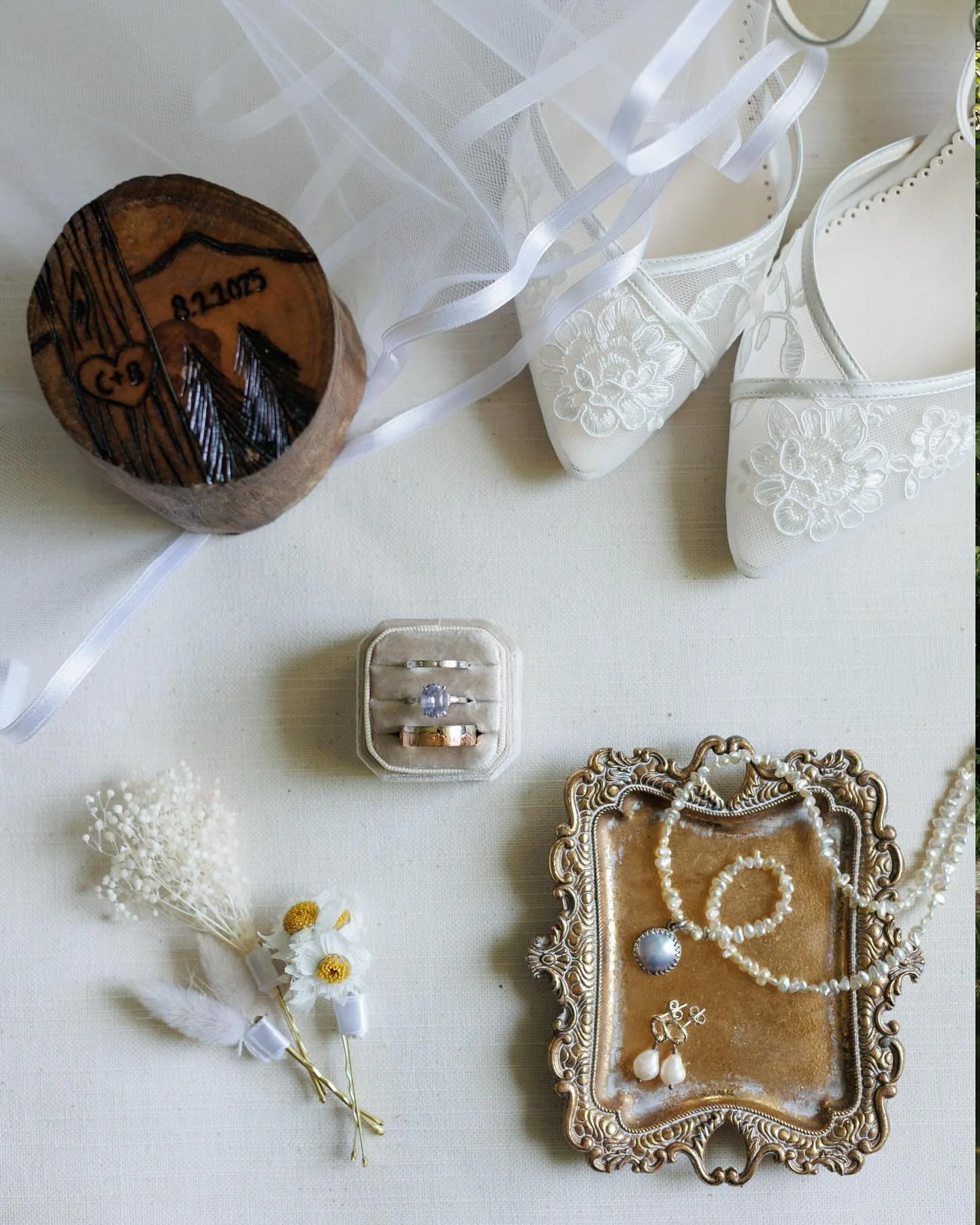 The vows were perfect, the cufflinks were maple leaves 🍁, and the reflections by the cabin? Straight out of a fairytale ✨💍 Vermont, you really showed off for these two. 🥂🤍

Which detail is your favorite&mdash;shoes, cufflinks, or cabin reflection