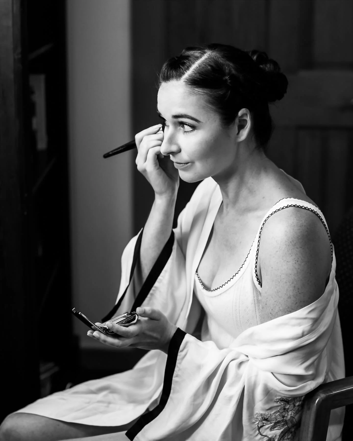 Clio getting ready, in black and white &mdash; that mix of calm and excitement that makes the morning feel so special. 

Swipe through for a glimpse of her morning story.

#vermontweddingphotographer
#vermontbride
#vermontwedding
#documentaryweddingp