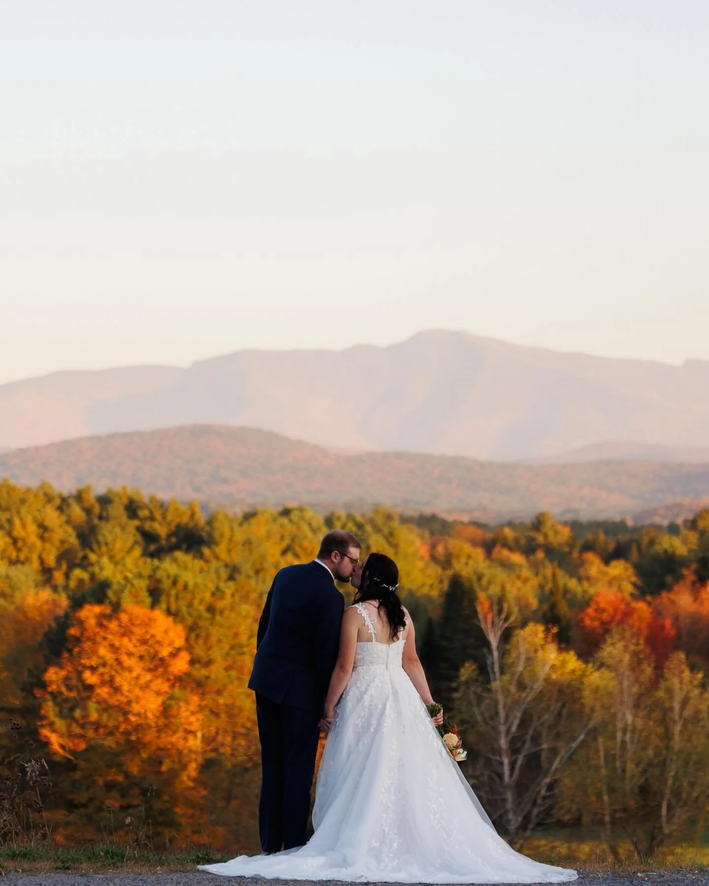 Golden hour at The Inn at Grace Farm.

The mountains.
The foliage.
That soft Vermont light that only lasts a few minutes.

This is why we build sunset portraits into the timeline &mdash; because when it hits like this, it&rsquo;s magic.

#VermontWedd