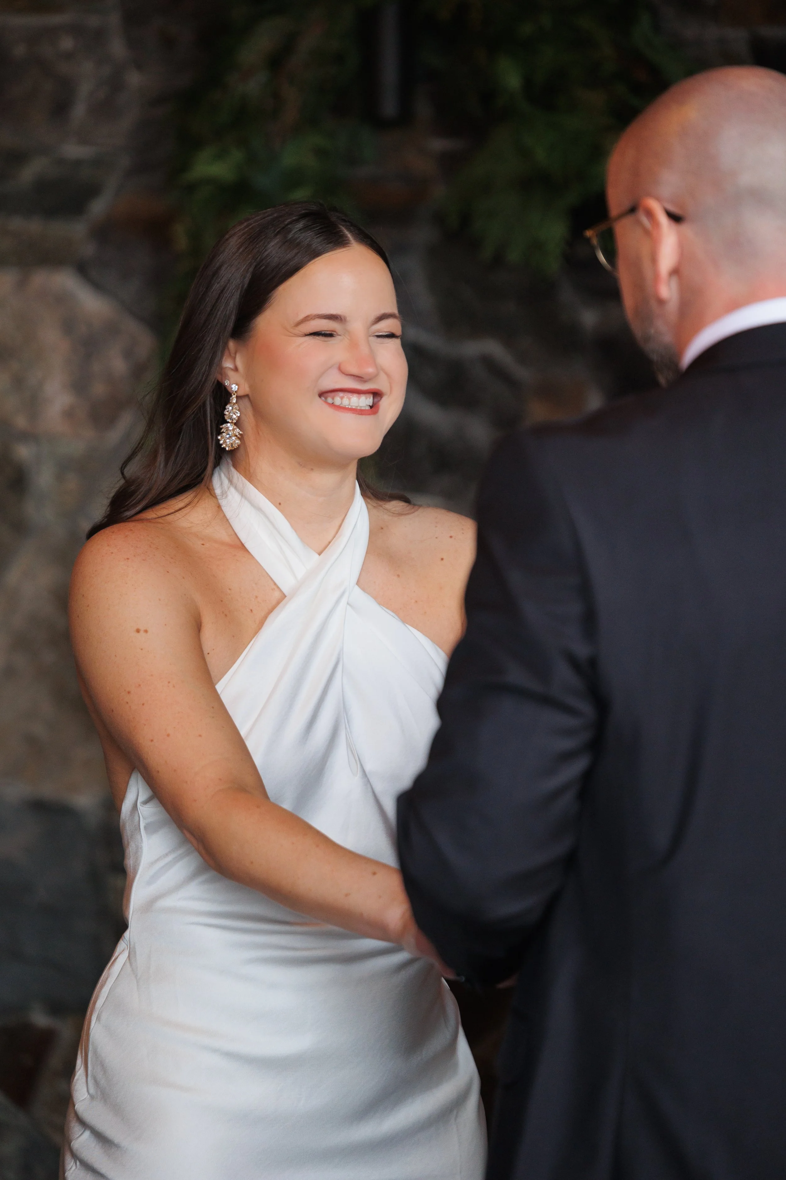 Outdoor winter elopement ceremony by the fire at Lake Placid Lodge in February