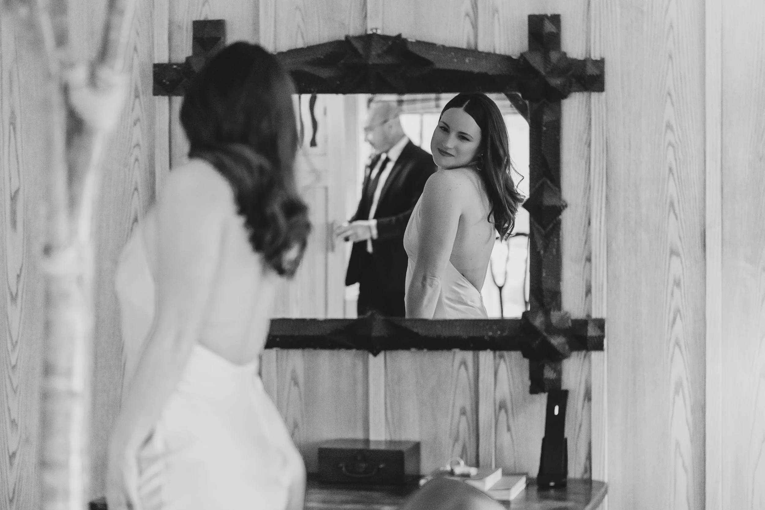 Outdoor winter elopement ceremony by the fire at Lake Placid Lodge in February