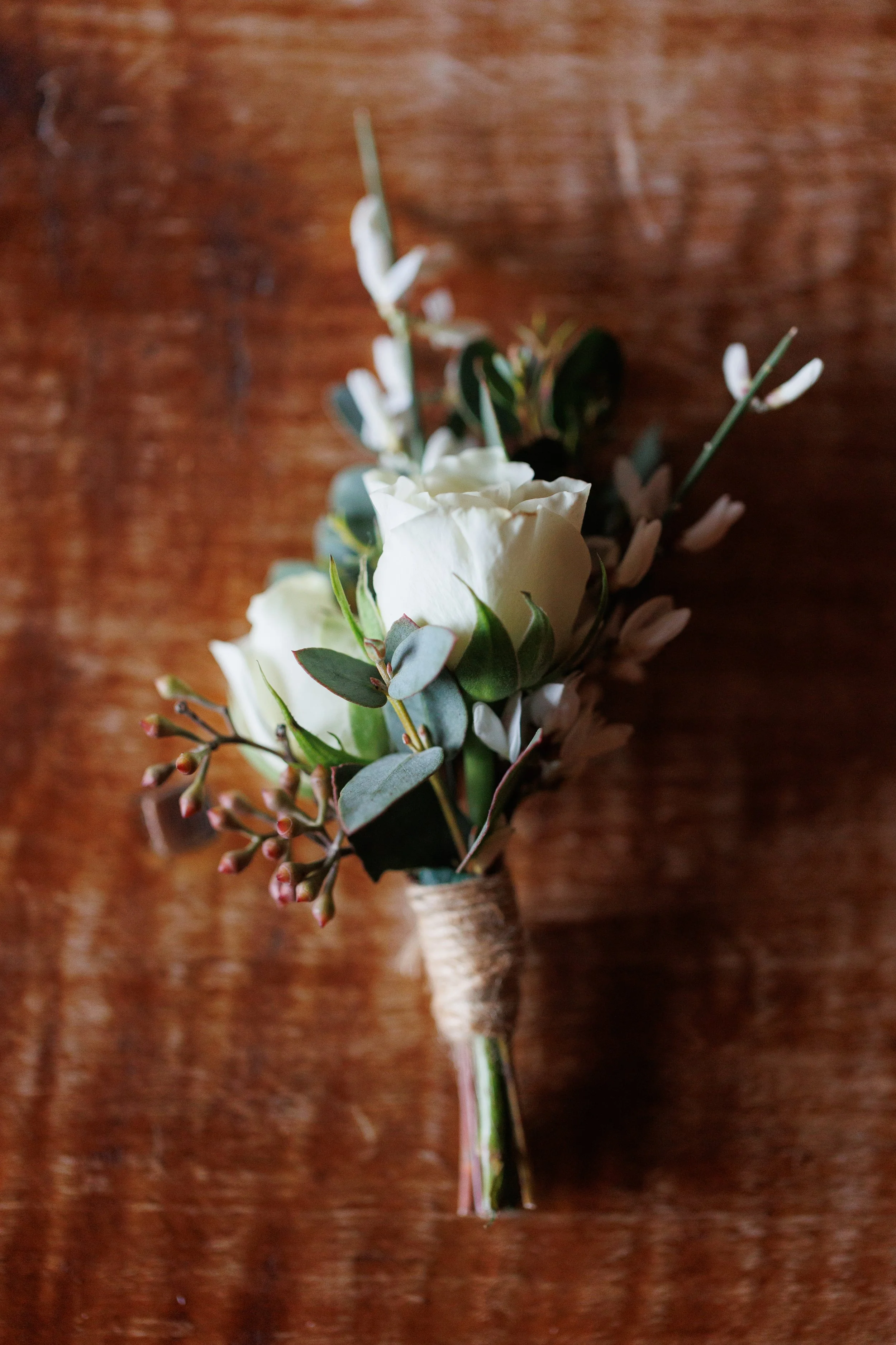 Outdoor winter elopement ceremony by the fire at Lake Placid Lodge in February
