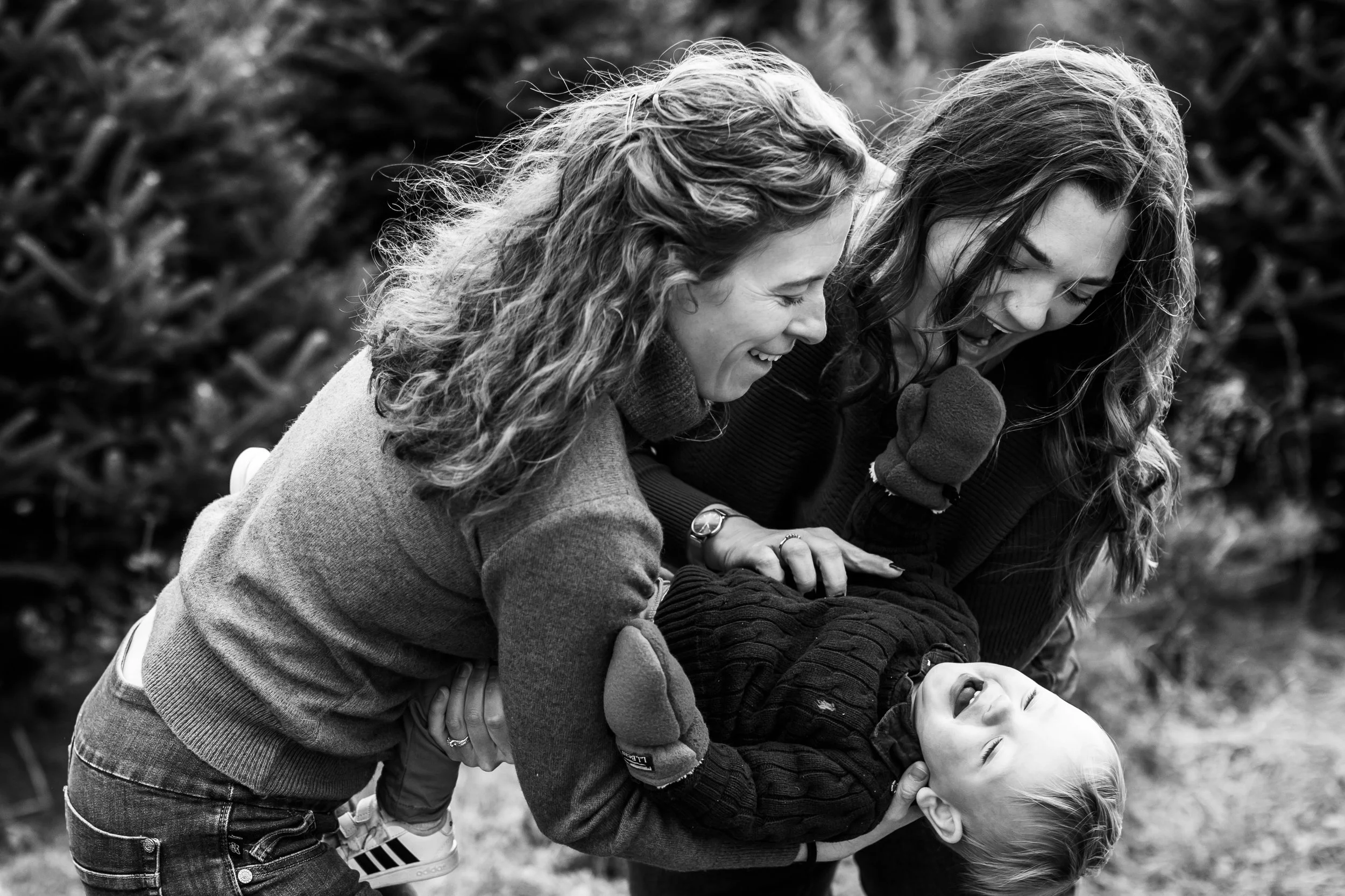 Two women playing with their baby in Vermont