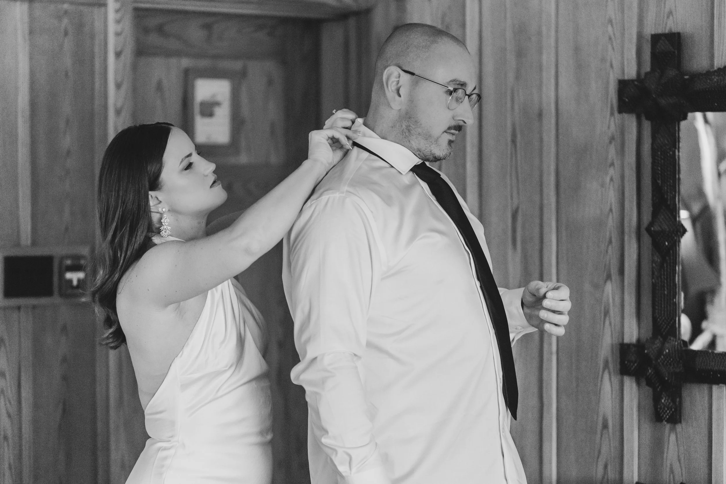 Outdoor winter elopement ceremony by the fire at Lake Placid Lodge in February