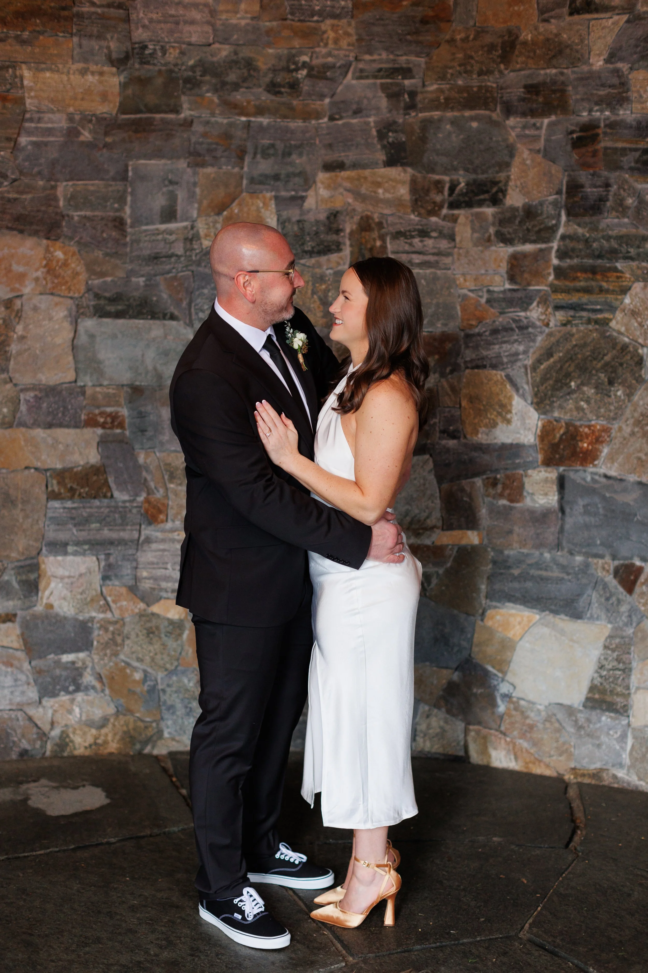 Outdoor winter elopement ceremony by the fire at Lake Placid Lodge in February