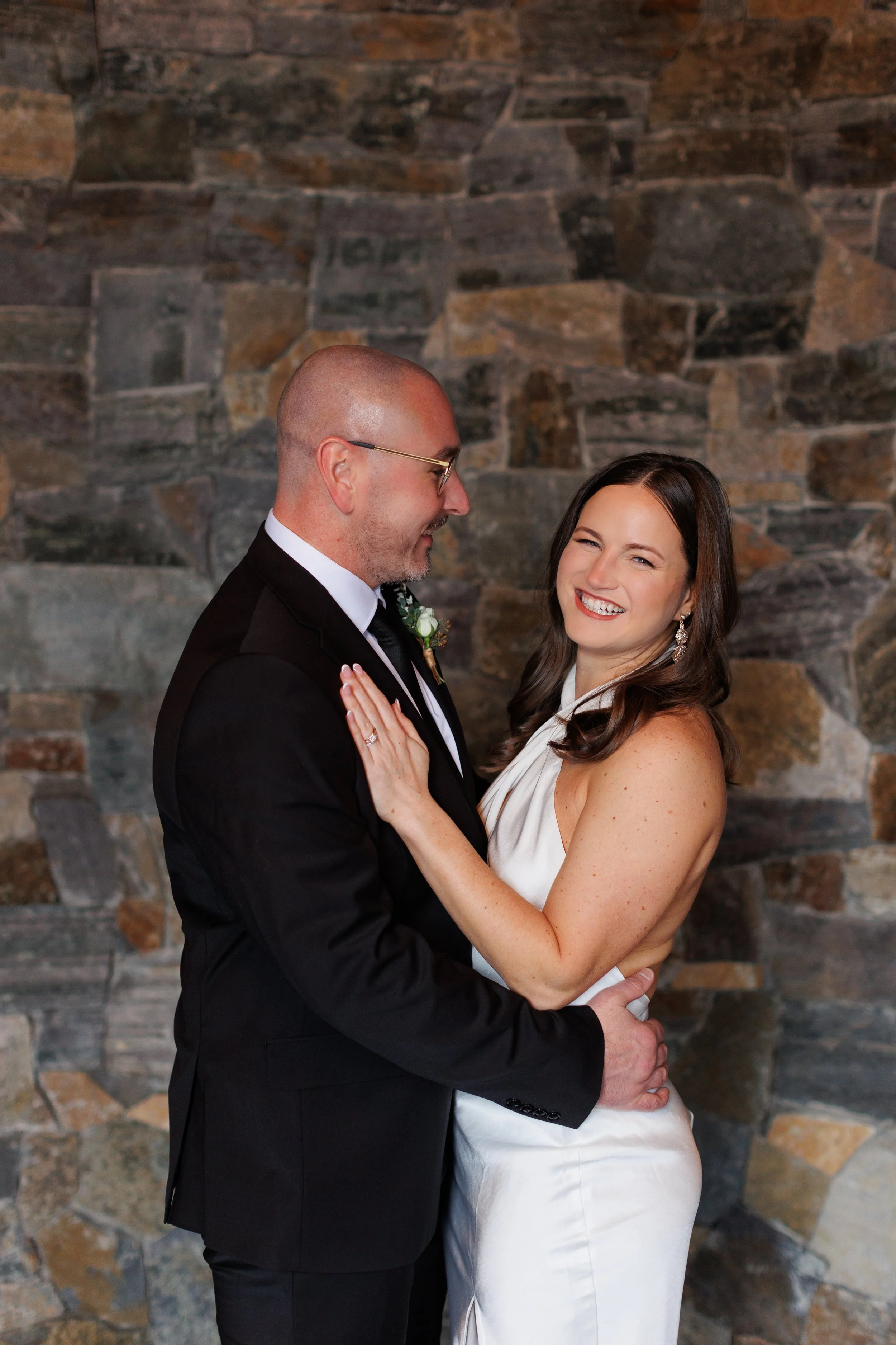 Outdoor winter elopement ceremony by the fire at Lake Placid Lodge in February