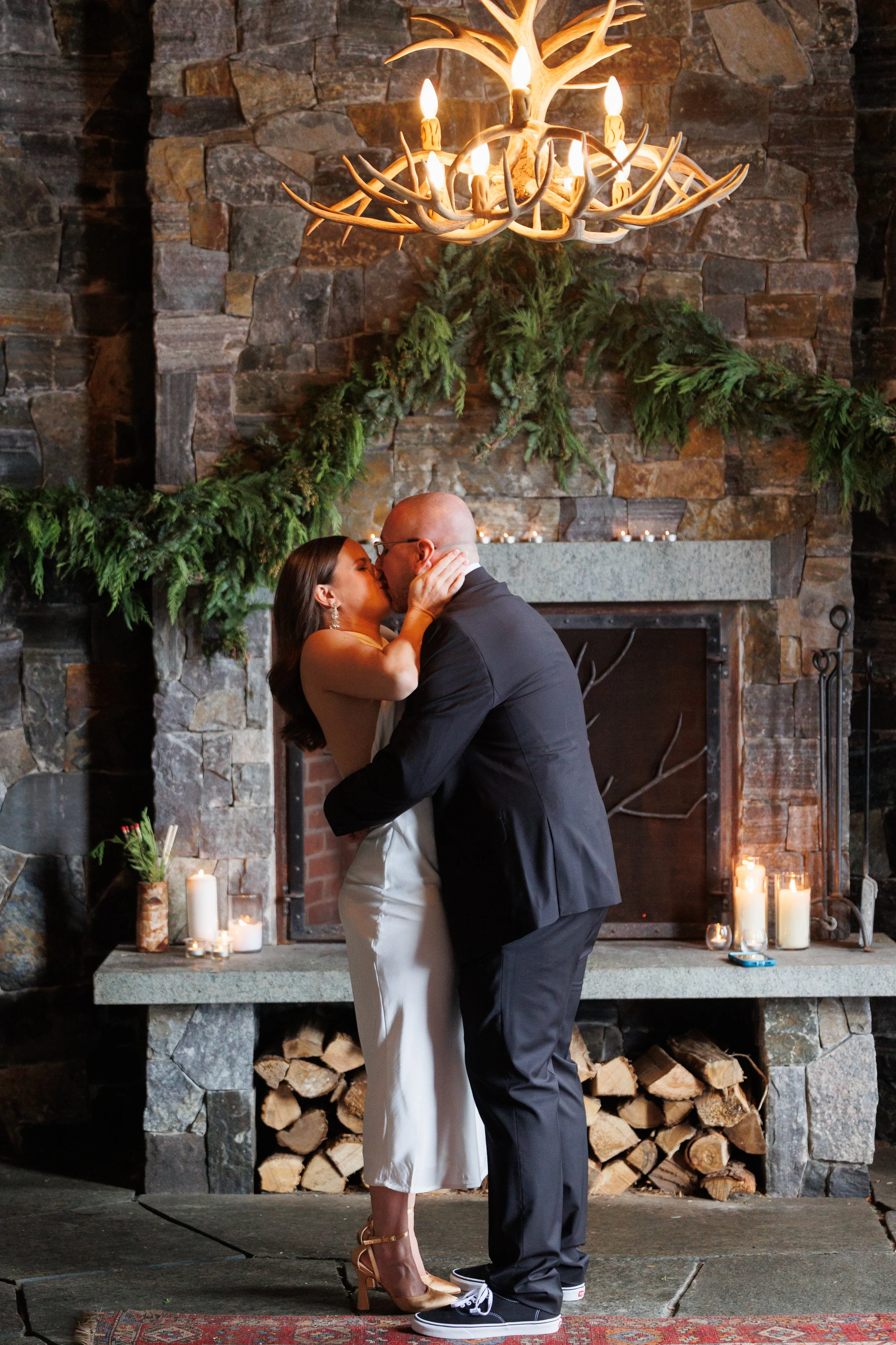 Outdoor winter elopement ceremony by the fire at Lake Placid Lodge in February