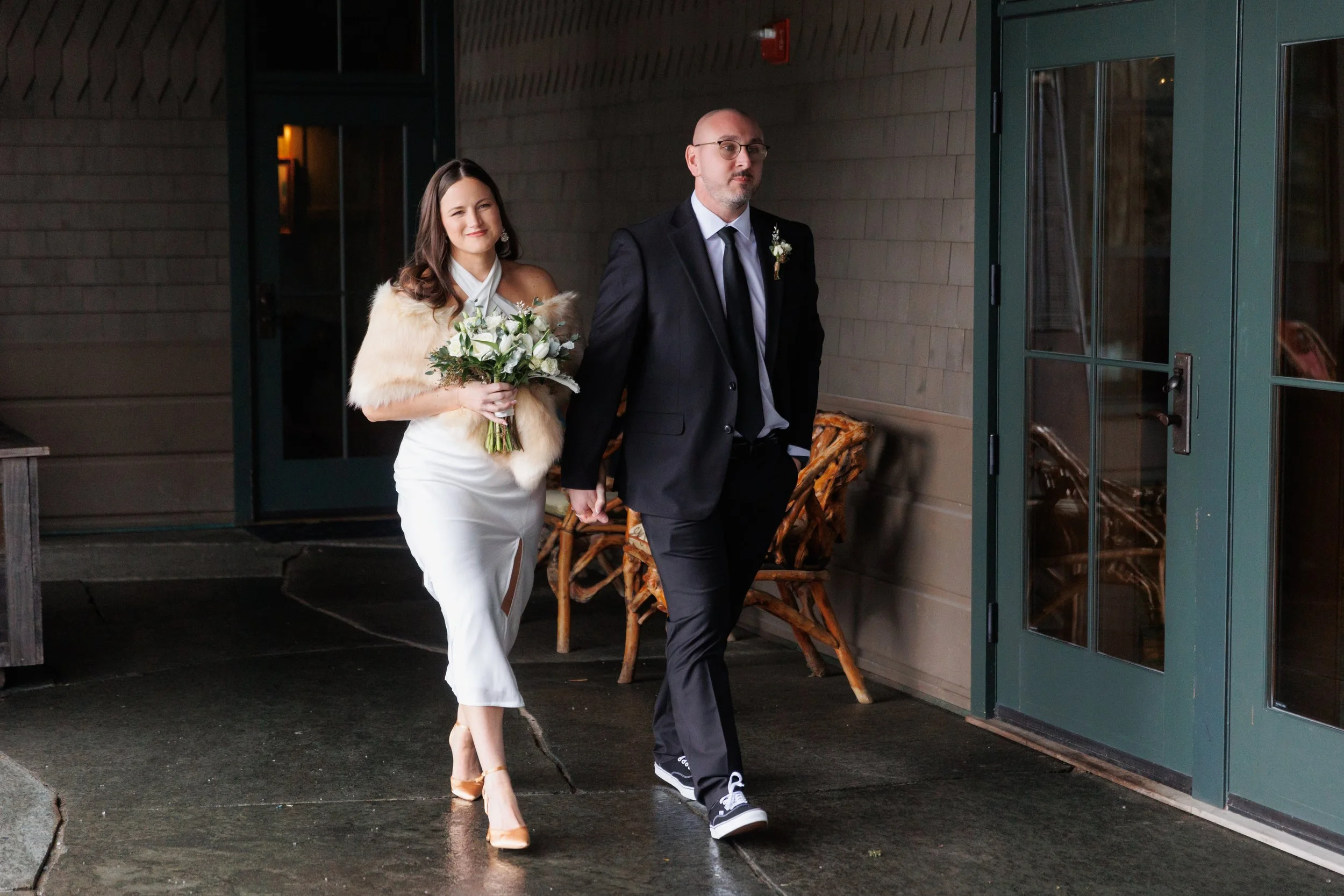 Outdoor winter elopement ceremony by the fire at Lake Placid Lodge in February