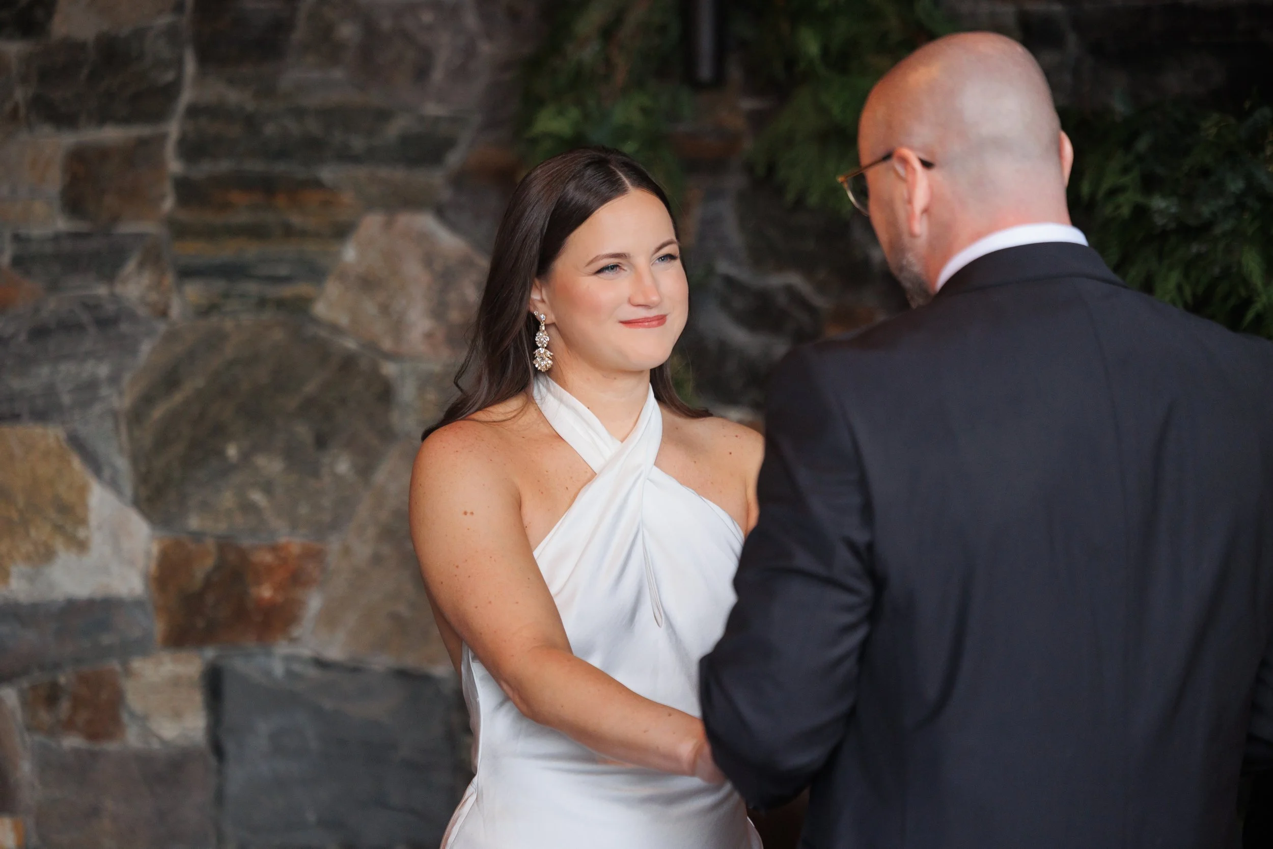 Outdoor winter elopement ceremony by the fire at Lake Placid Lodge in February