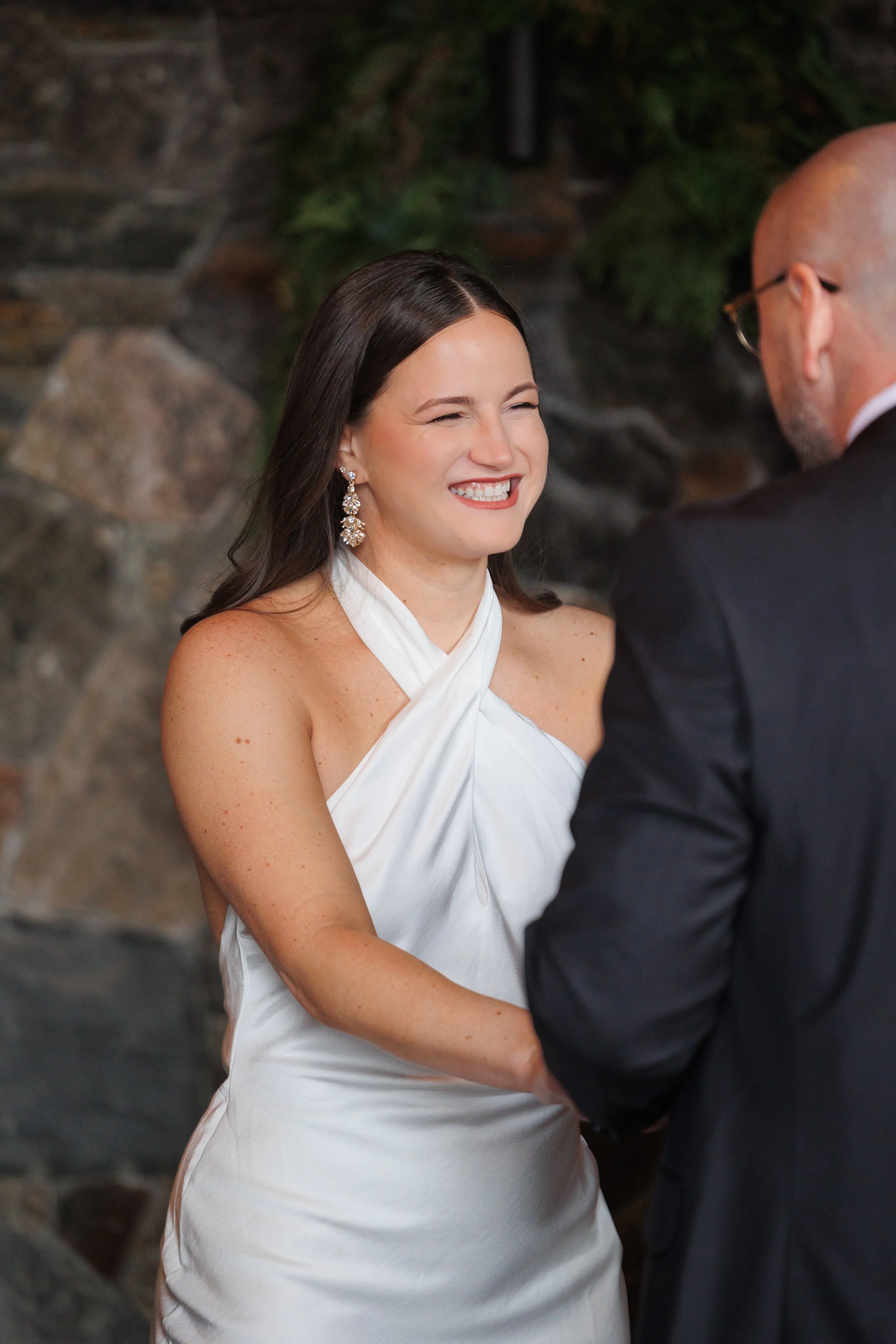 Outdoor winter elopement ceremony by the fire at Lake Placid Lodge in February