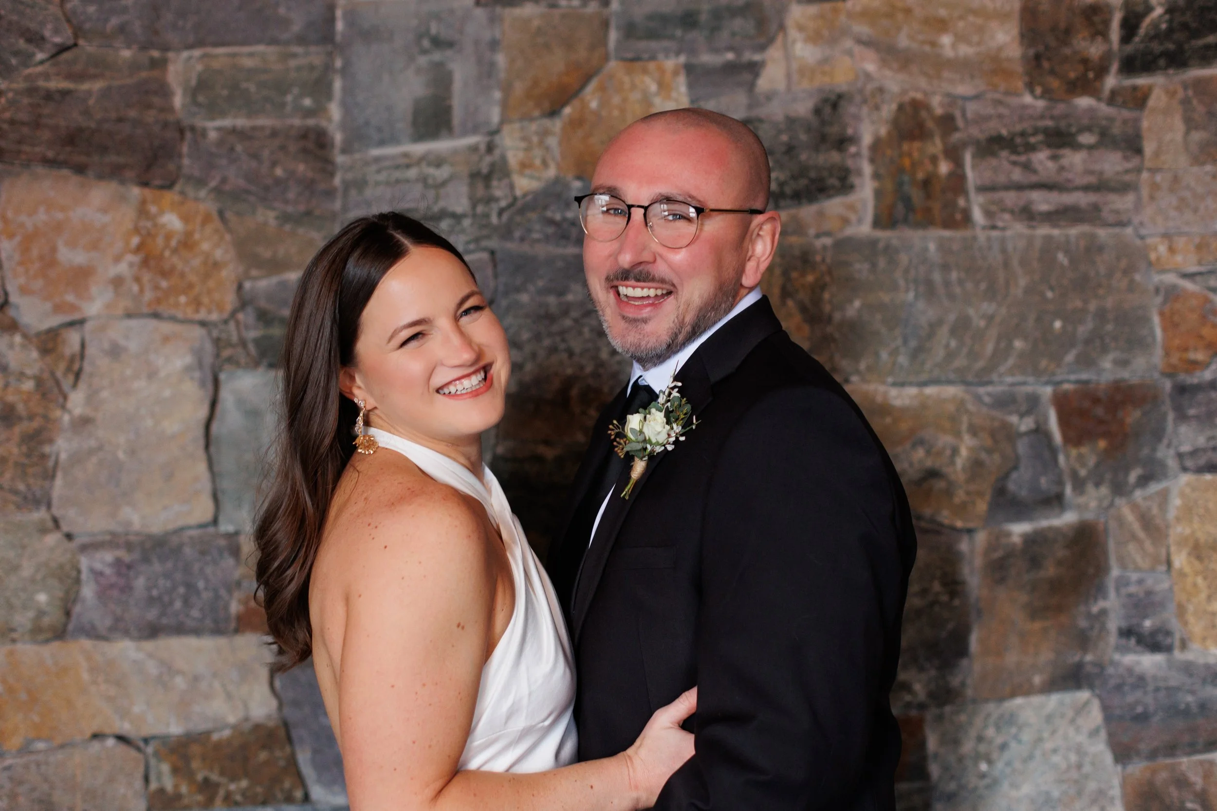Outdoor winter elopement ceremony by the fire at Lake Placid Lodge in February